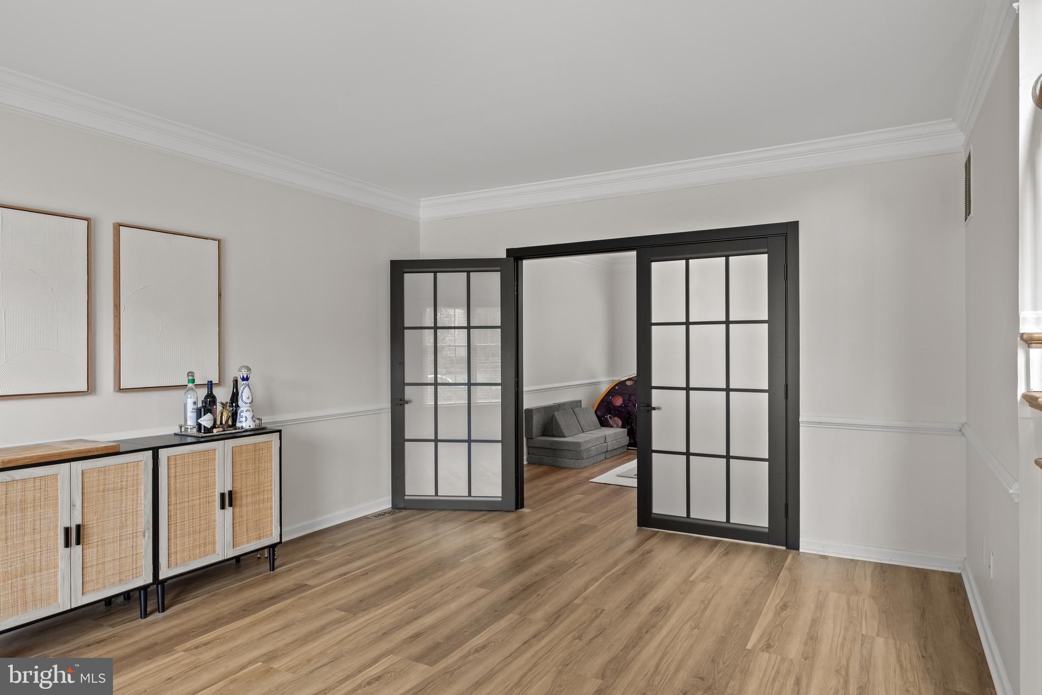 97 Brooks Road Moorestown, NJ 08057 - Photo 7 of 47 a view of a room with wooden floor and windows