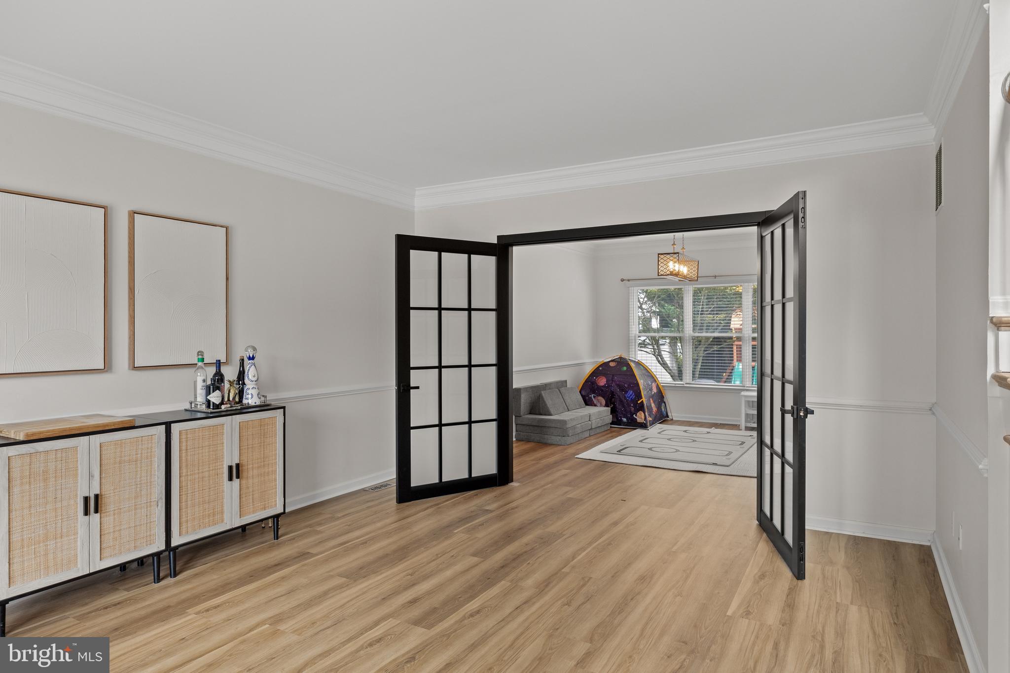 97 Brooks Road Moorestown, NJ 08057 - Photo 8 of 47 a man sitting on a bench in a room