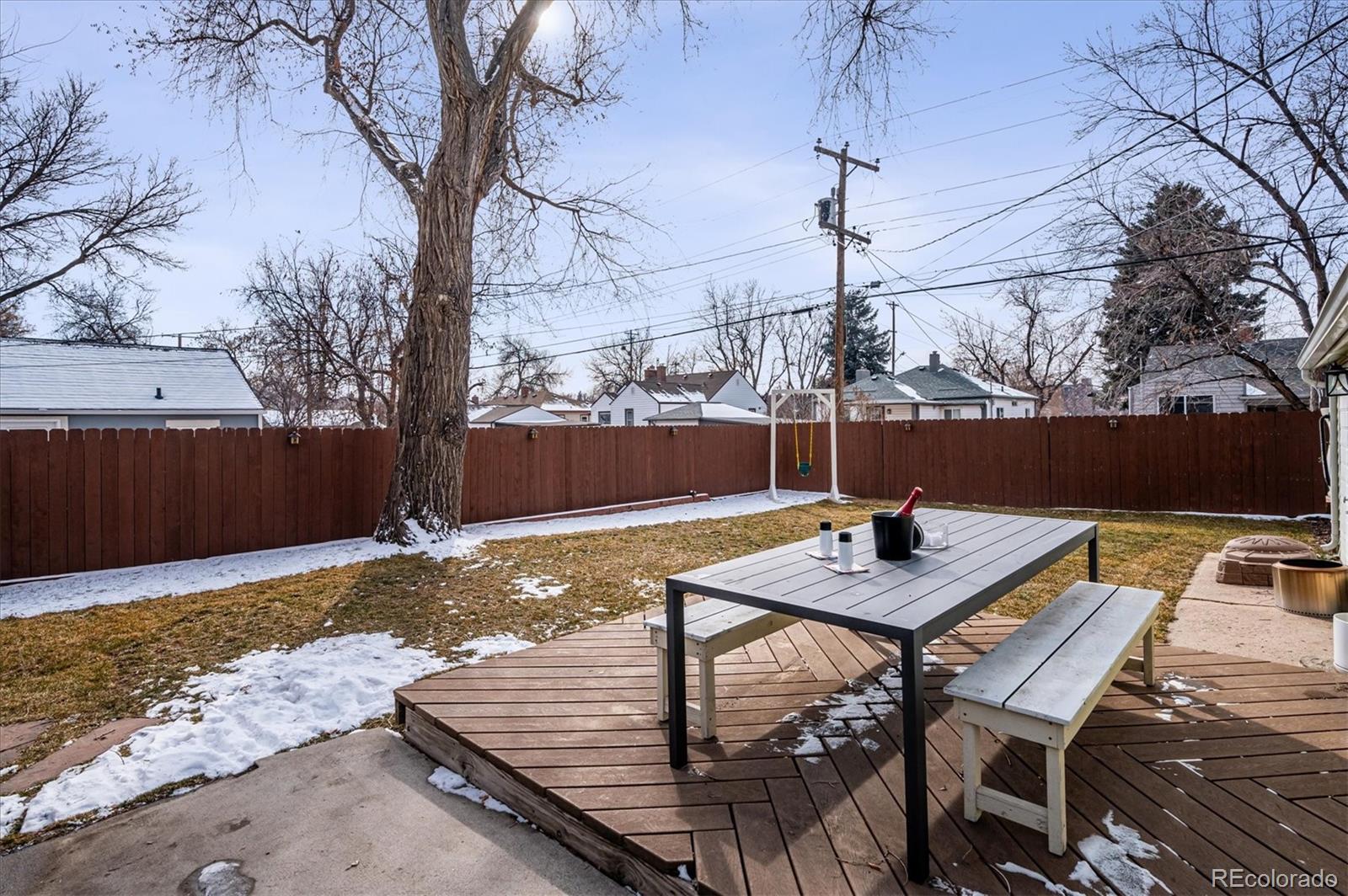 3885 Quay Street Wheat Ridge, CO 80033 - Photo 35 of 40 a view of a backyard with sitting area