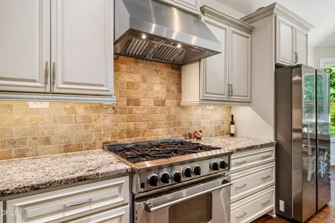 $975,000 | 212 Middlegreen Place, Holly Springs, NC 27540