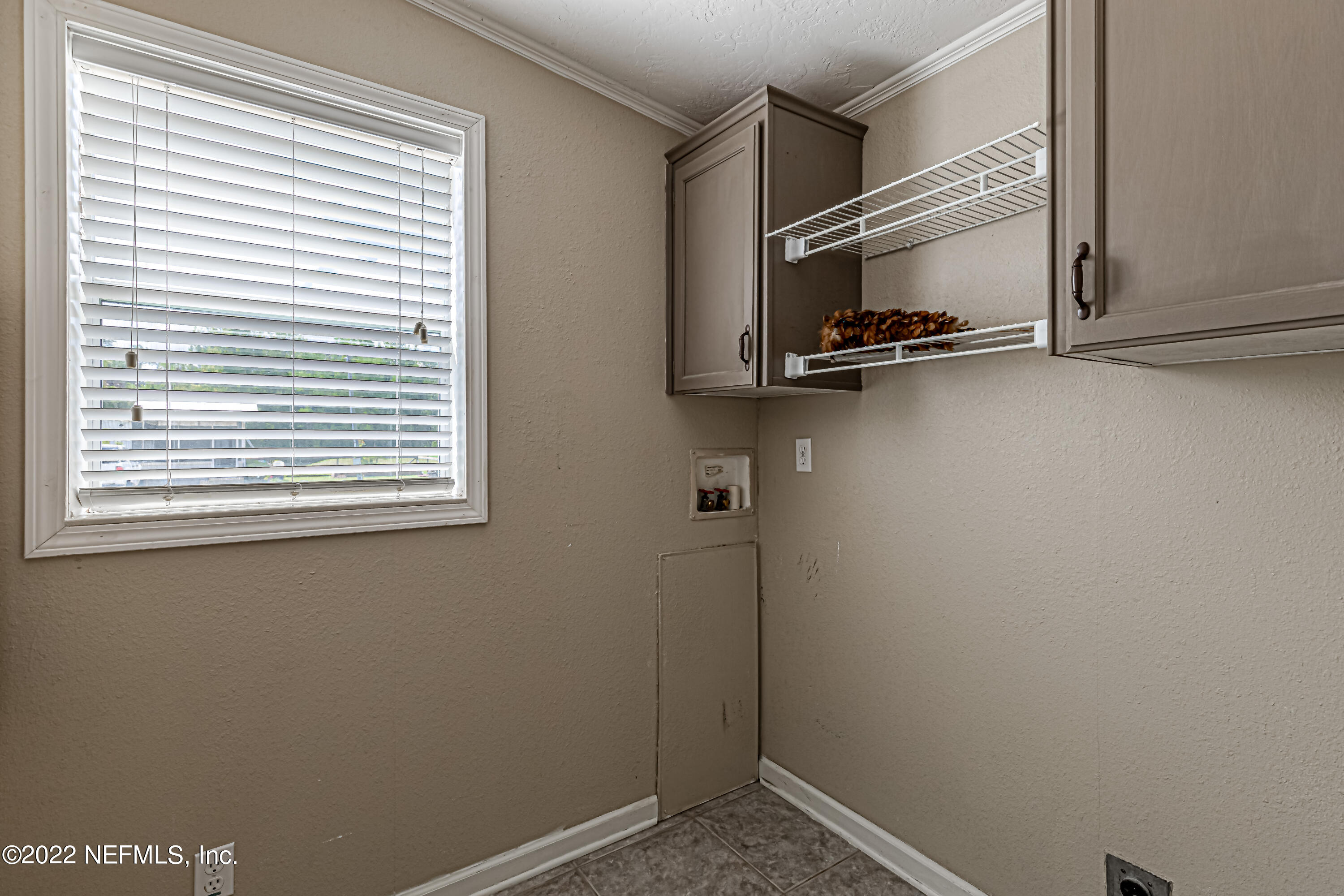 1376 Marlee Road, Unit 1 St. Johns, FL 32259 - Photo 23 of 50 a view of an empty room with a window