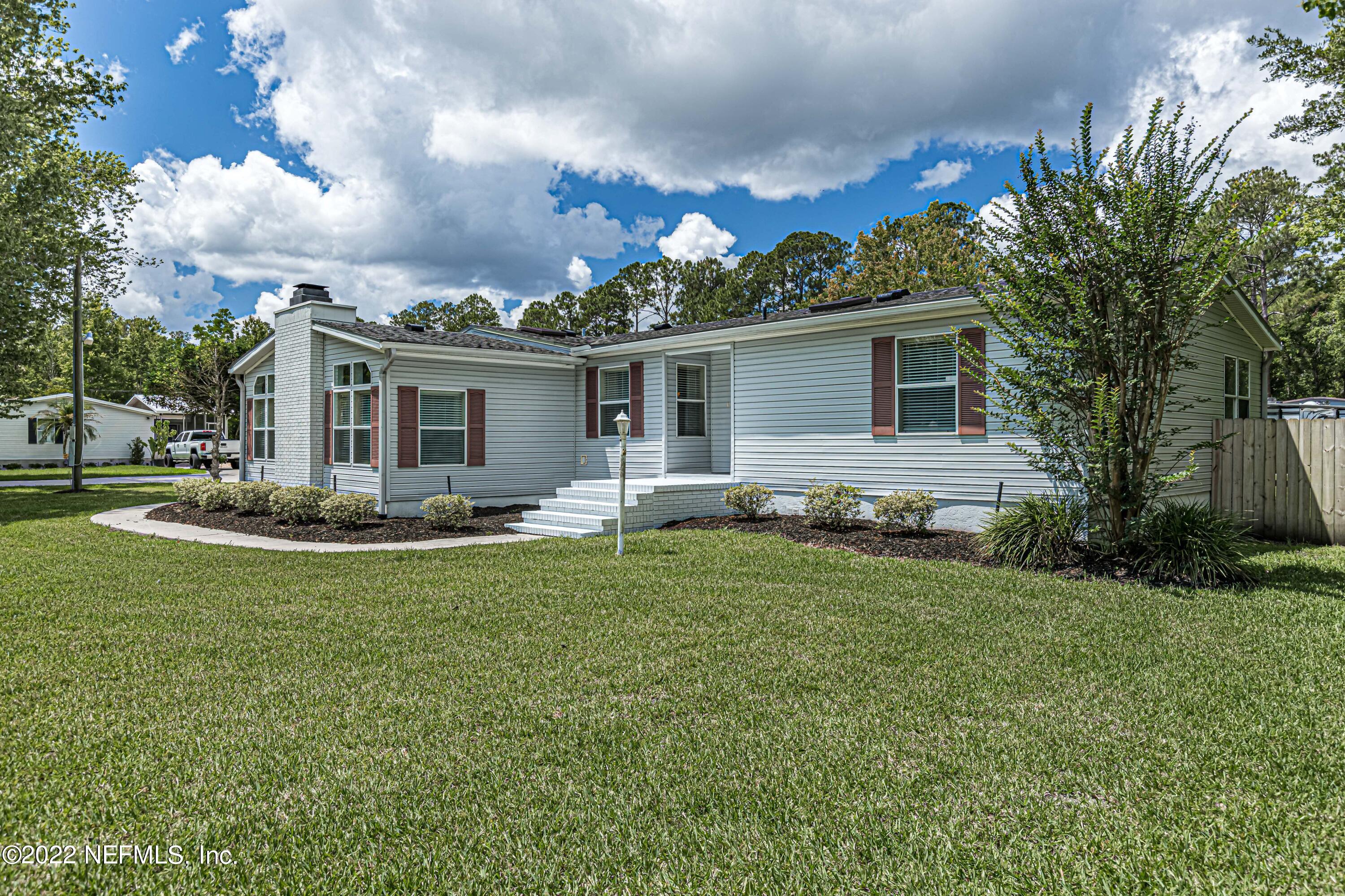 1376 Marlee Road, Unit 1 St. Johns, FL 32259 - Photo 3 of 50 a front view of a house with garden