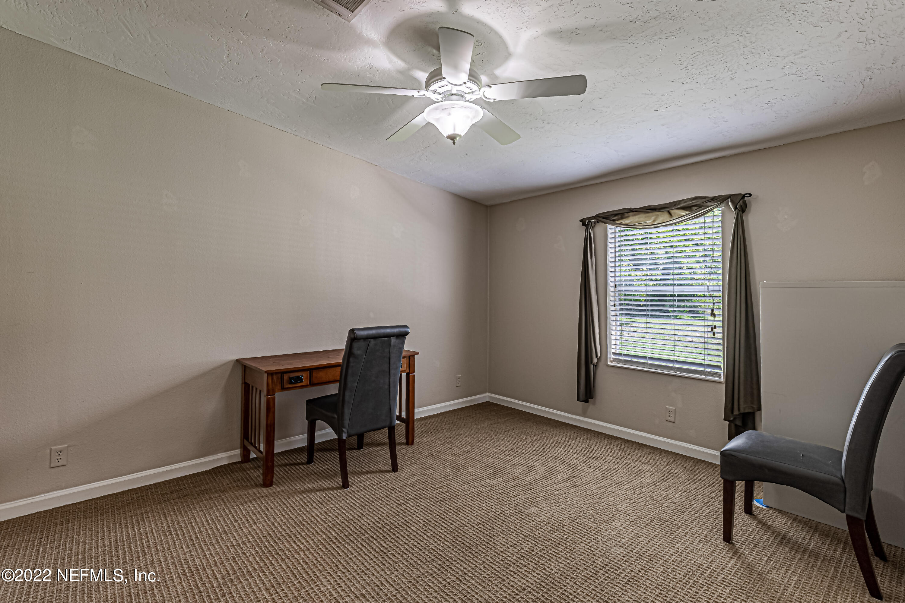 1376 Marlee Road, Unit 1 St. Johns, FL 32259 - Photo 32 of 50 a view of a workspace with furniture and a window