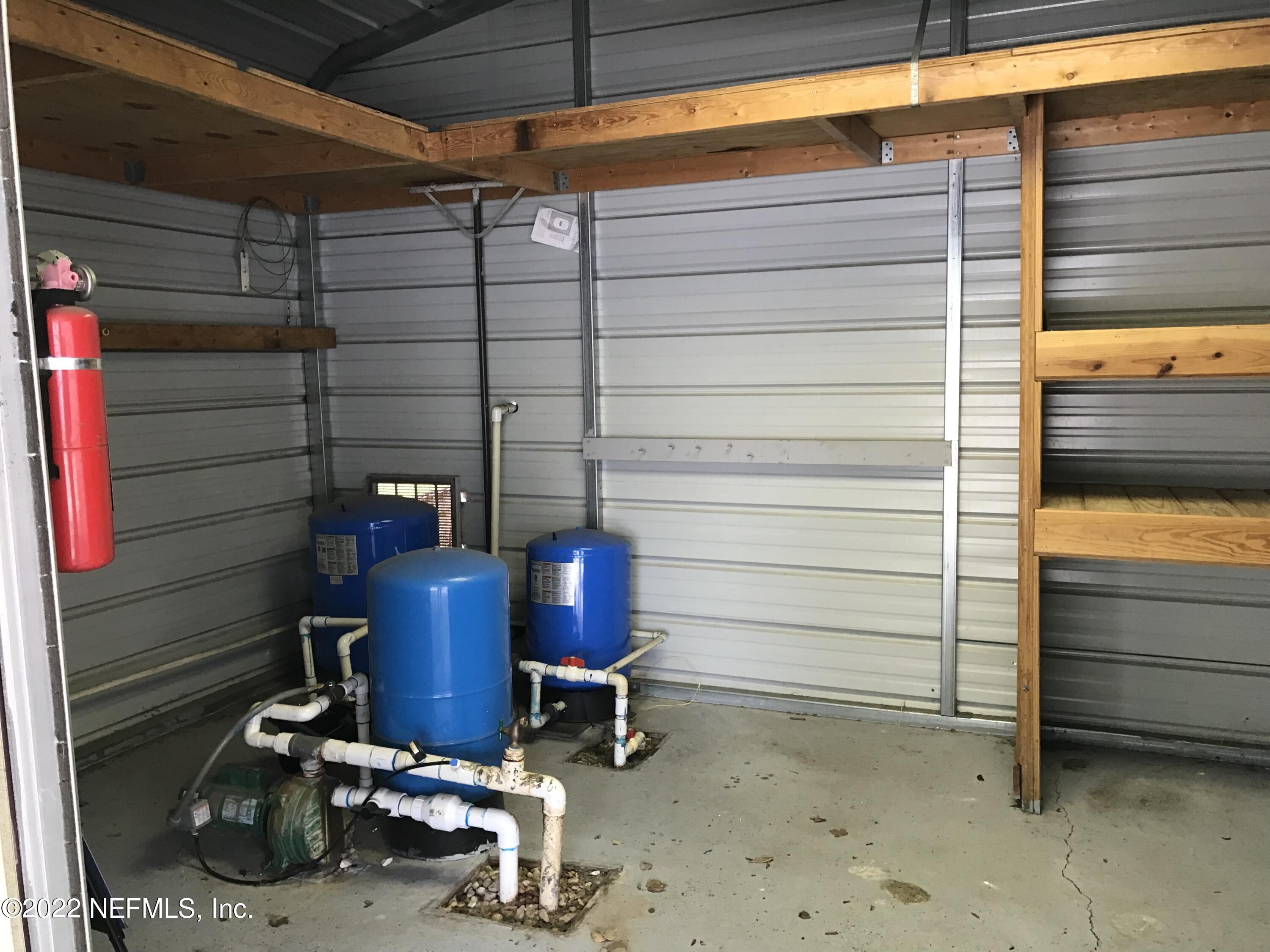 1376 Marlee Road, Unit 1 St. Johns, FL 32259 - Photo 46 of 50 Storage Closet Well & Irrigation Pumps