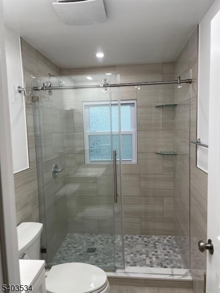 19 Rosedale Avenue Montclair, NJ 07042 - Photo 6 of 9 a bathroom with a shower and toilet