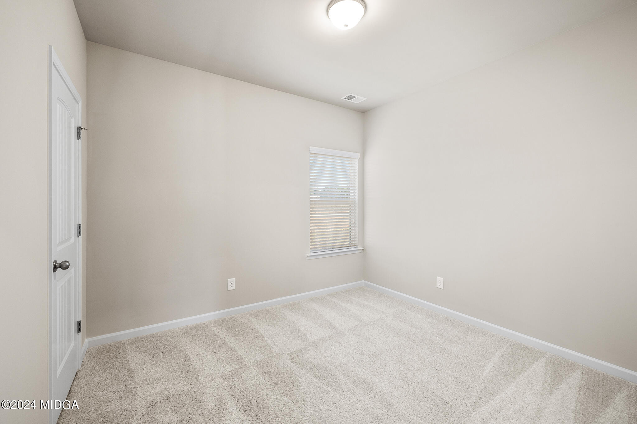 499 Grand Magnolia Street Jackson, GA 30233 - Photo 16 of 35 a view of an empty room