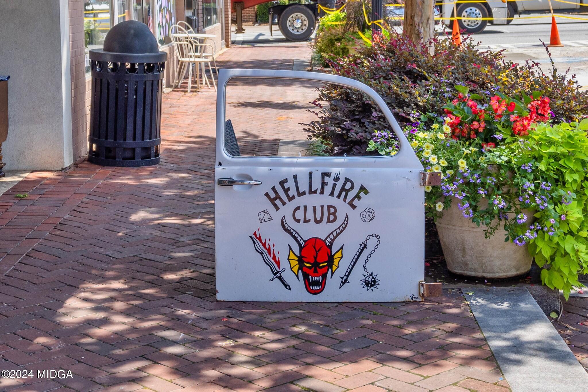 499 Grand Magnolia Street Jackson, GA 30233 - Photo 27 of 35 a sign that is on the side of the road