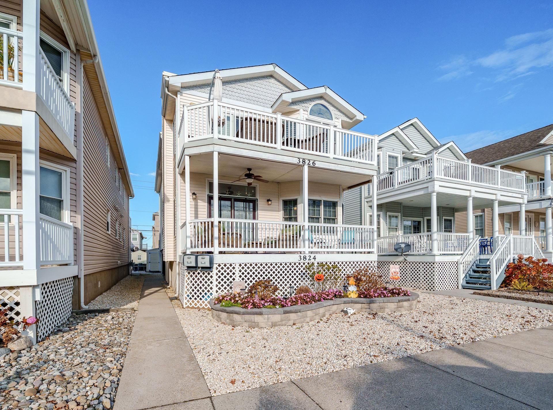 3824 Asbury Avenue, Unit 1 Ocean City, NJ 08226 - Photo 1 of 40 a front view of a building with glass windows