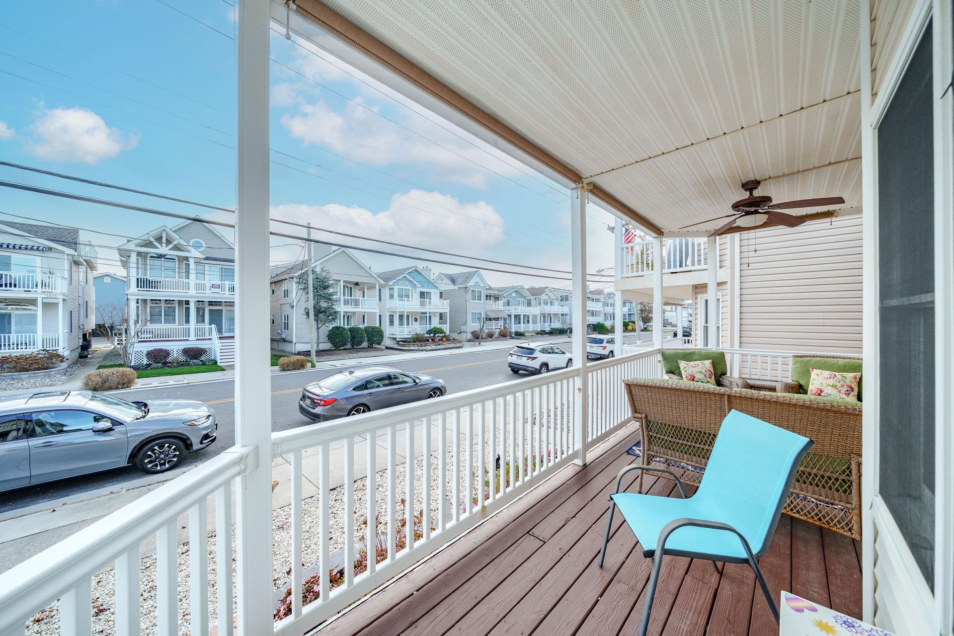 3824 Asbury Avenue, Unit 1 Ocean City, NJ 08226 - Photo 13 of 40 a view of a porch with furniture