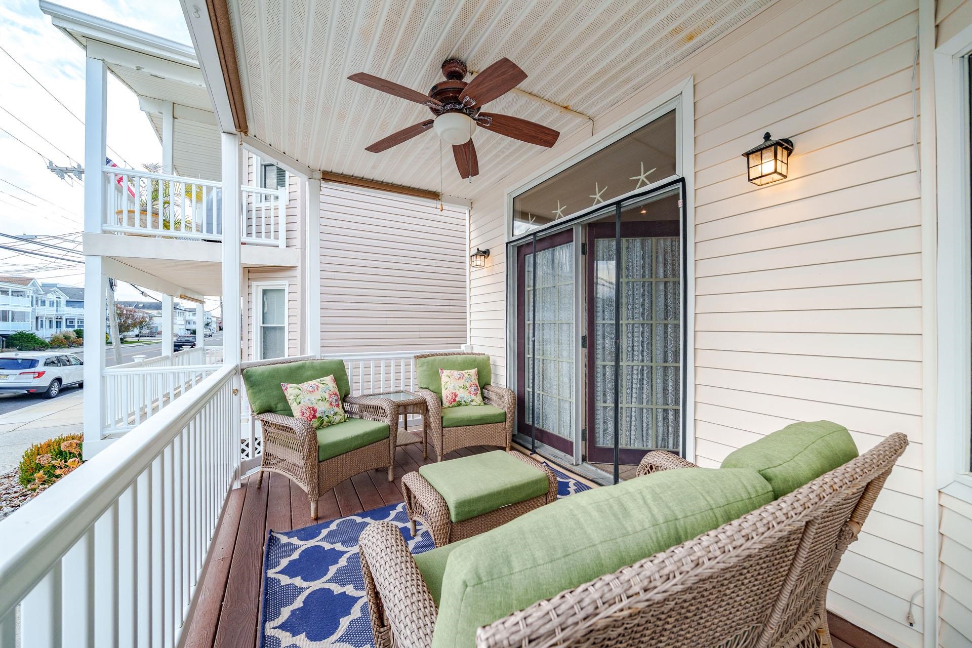 3824 Asbury Avenue, Unit 1 Ocean City, NJ 08226 - Photo 14 of 40 a balcony with furniture and a window