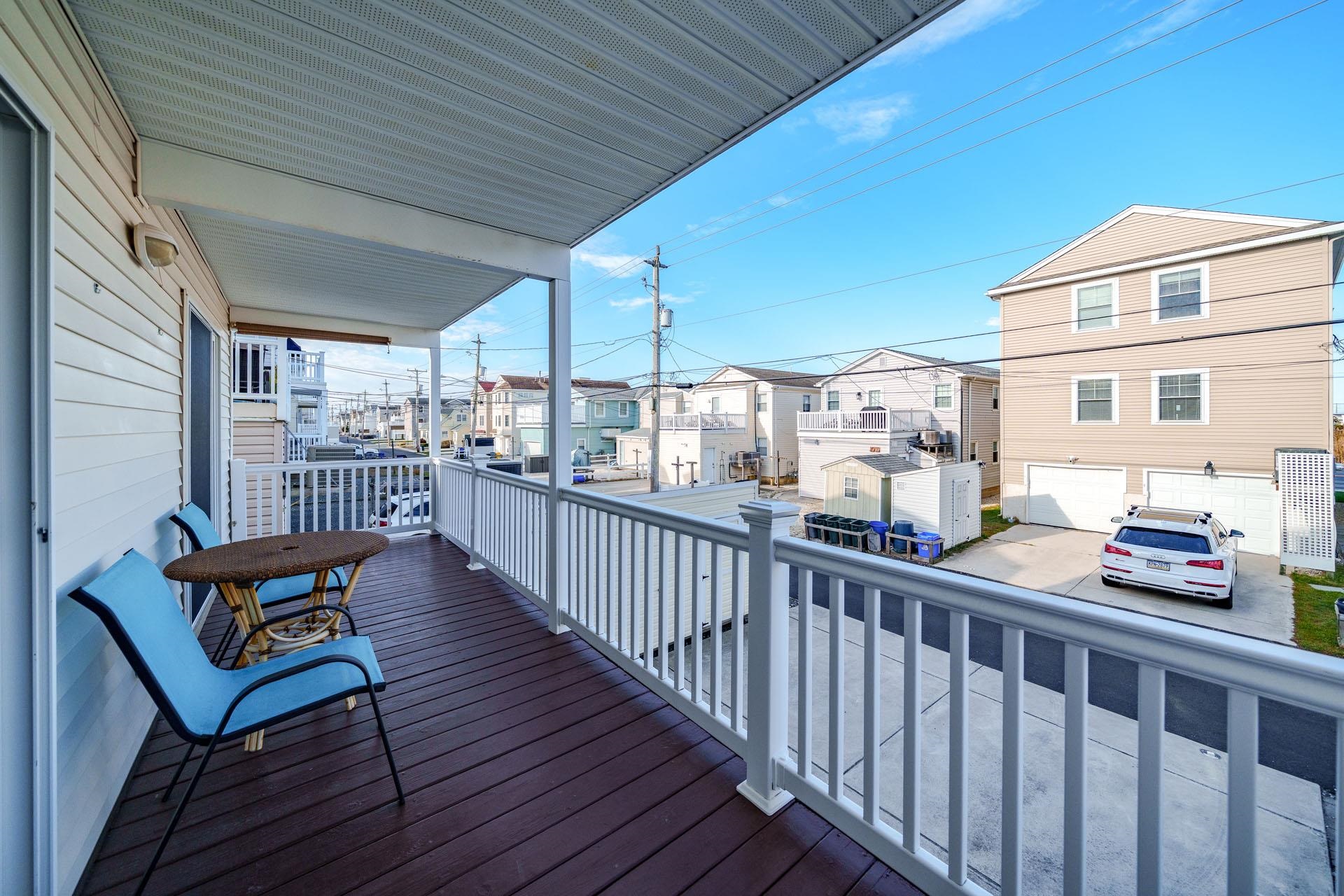 3824 Asbury Avenue, Unit 1 Ocean City, NJ 08226 - Photo 27 of 40 a view of a balcony with wooden floor