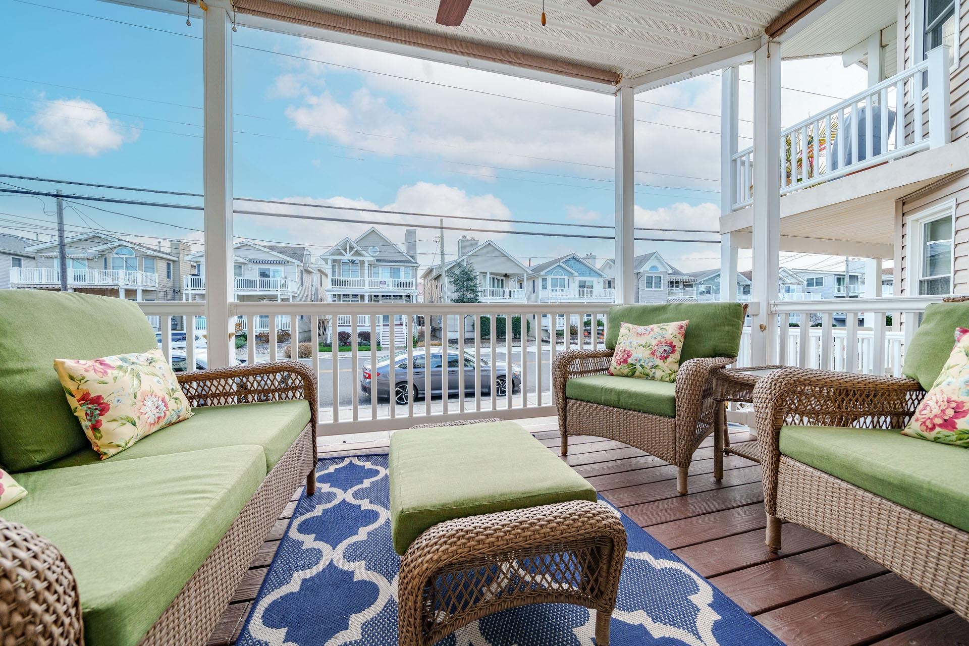 3824 Asbury Avenue, Unit 1 Ocean City, NJ 08226 - Photo 3 of 40 a living room with furniture and a large window