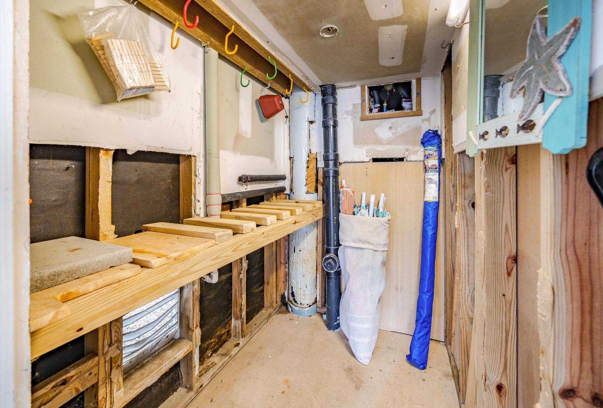 3824 Asbury Avenue, Unit 1 Ocean City, NJ 08226 - Photo 33 of 40 a bathroom with a granite countertop sink and a large mirror