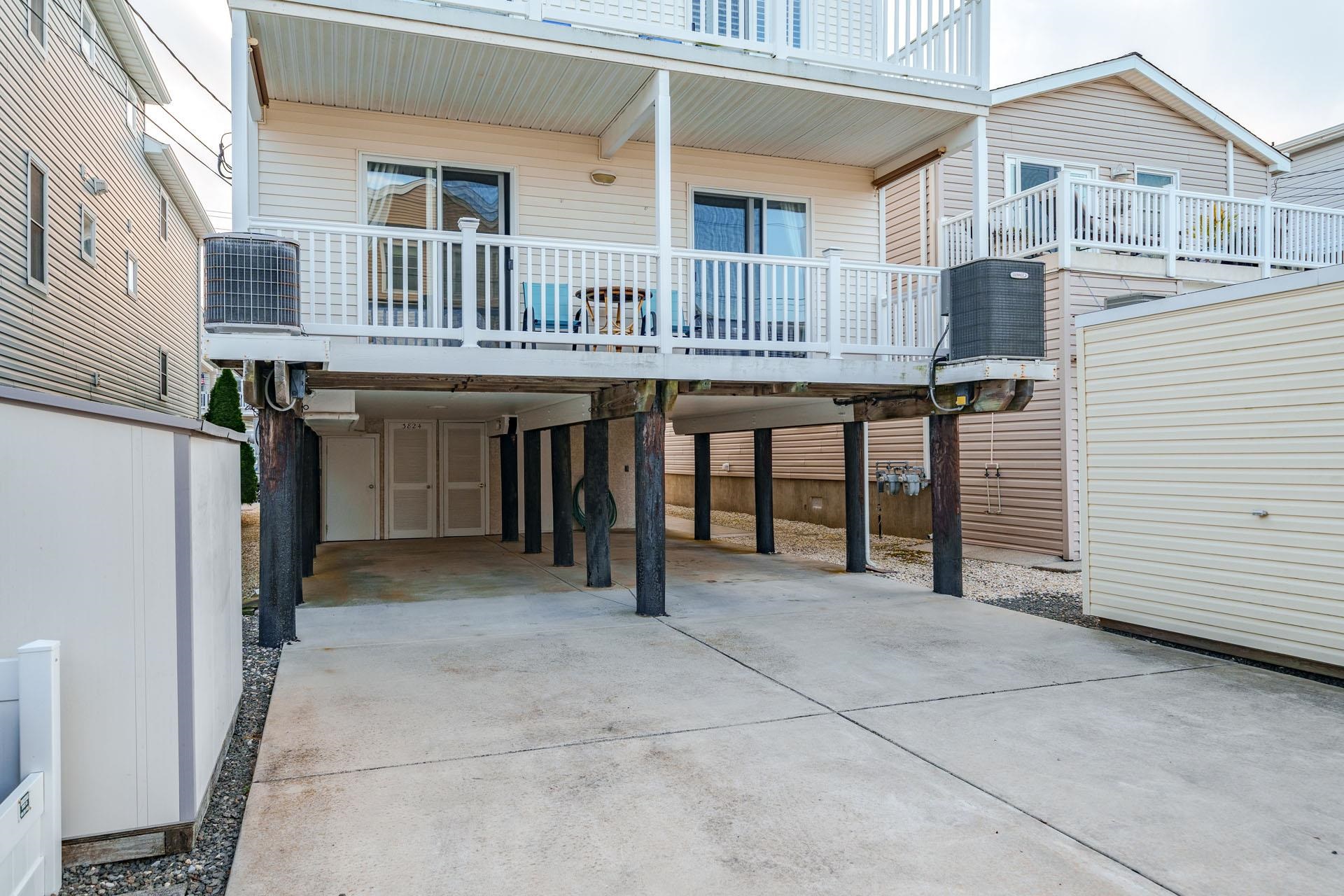 3824 Asbury Avenue, Unit 1 Ocean City, NJ 08226 - Photo 35 of 40 a view of a house with a porch