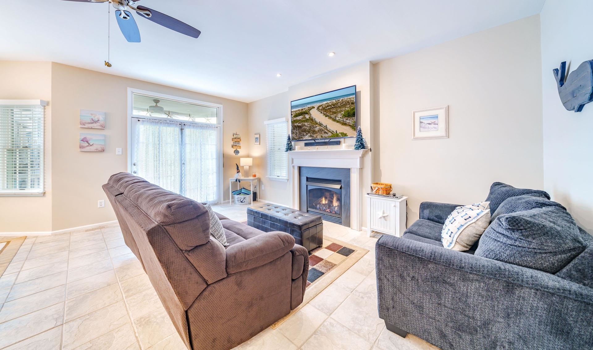 3824 Asbury Avenue, Unit 1 Ocean City, NJ 08226 - Photo 5 of 40 a living room with furniture and a fireplace