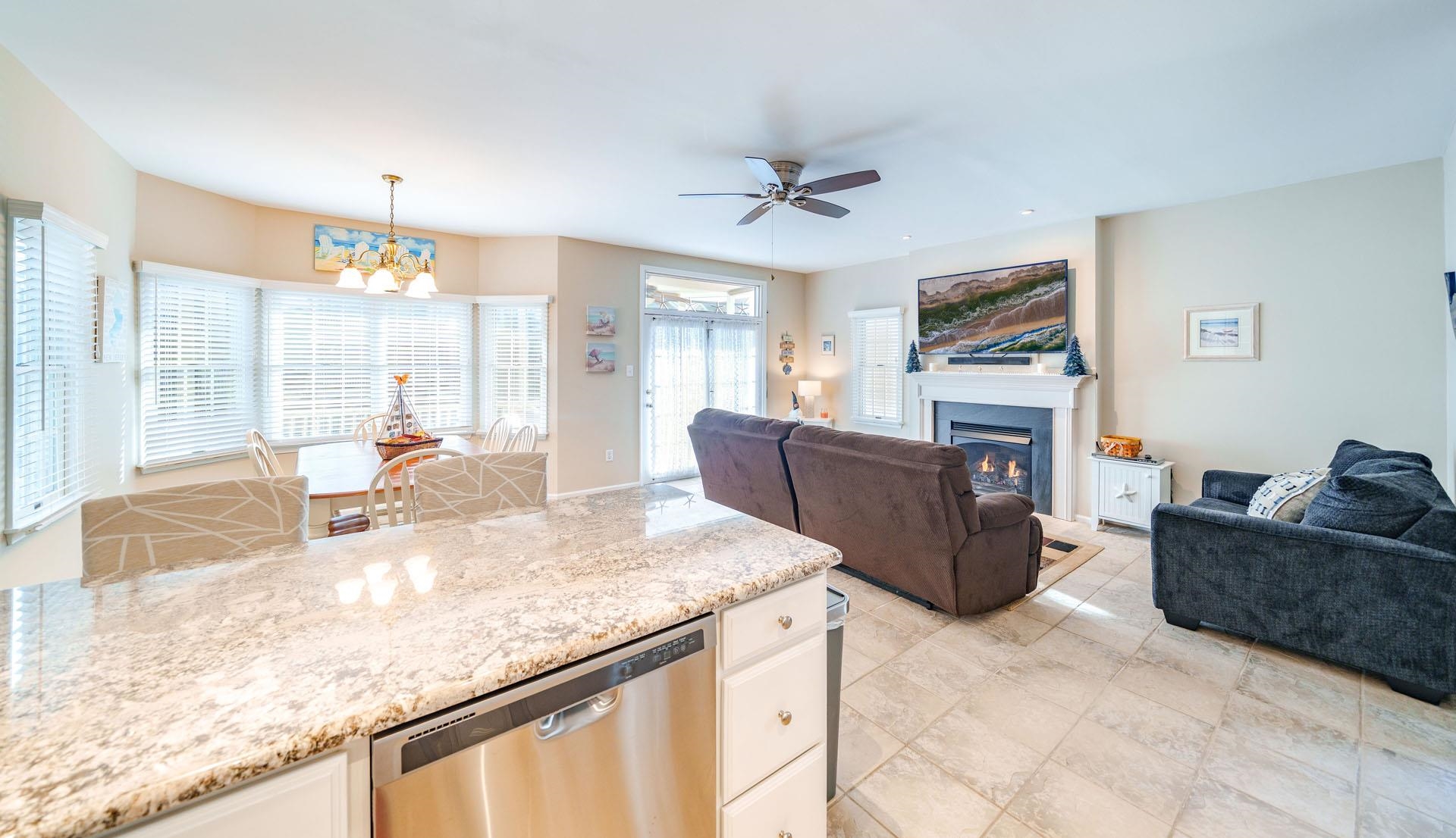 3824 Asbury Avenue, Unit 1 Ocean City, NJ 08226 - Photo 10 of 40 a living room with furniture and a flat screen tv