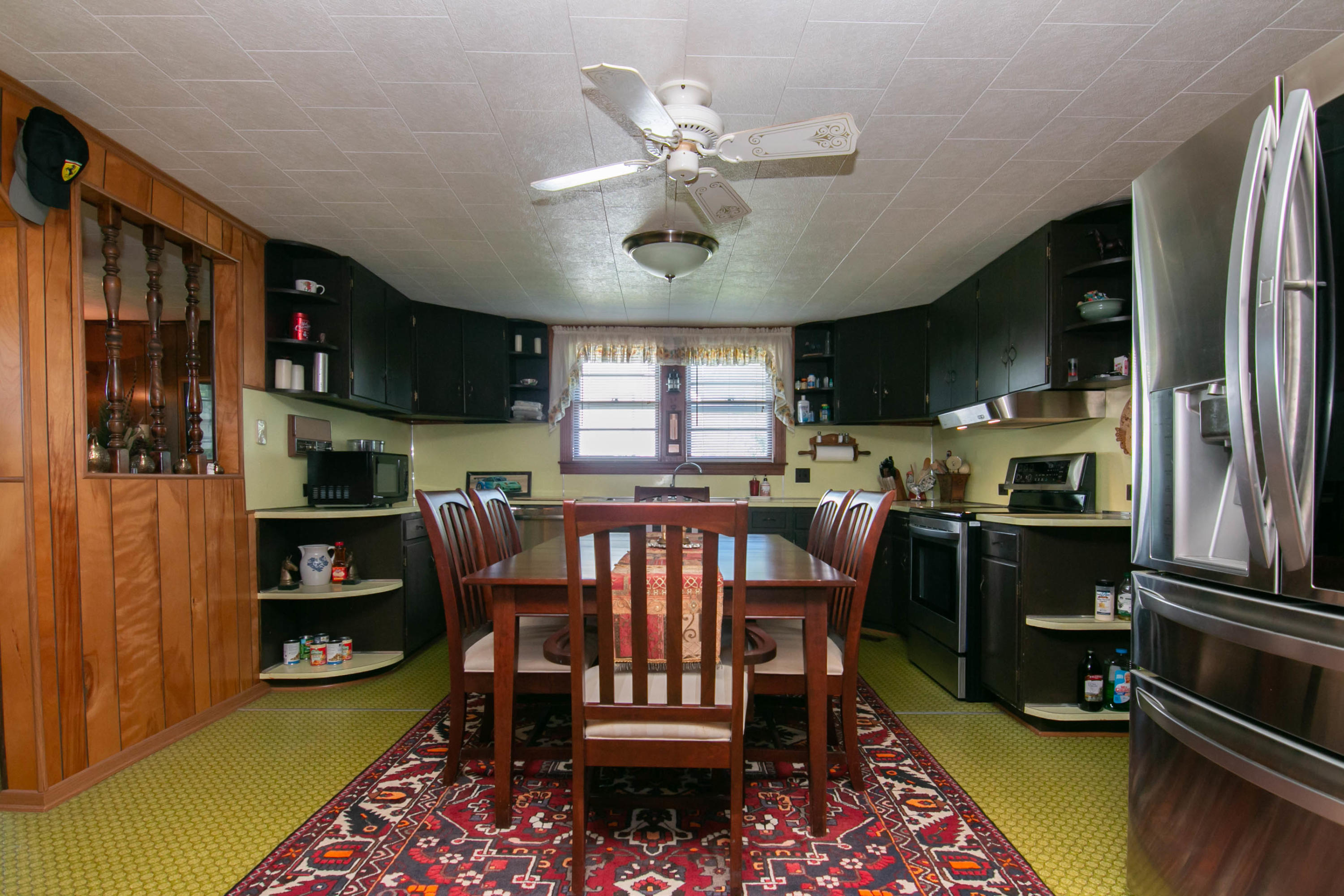 3257 Sago Road Chatham, VA 24531 - Photo 29 of 94 a view of kitchen center island dining table wooden floor and a window