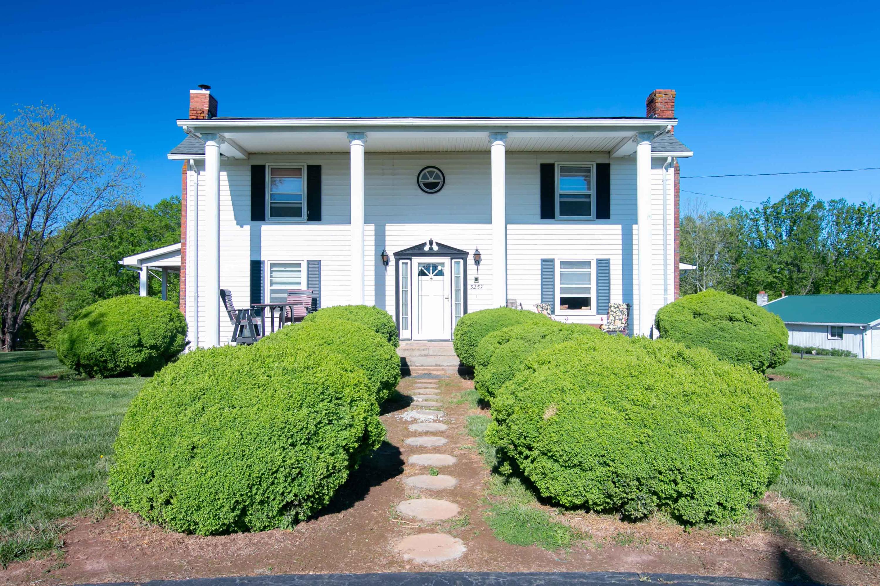3257 Sago Road Chatham, VA 24531 - Photo 4 of 94 a front view of a house with garden