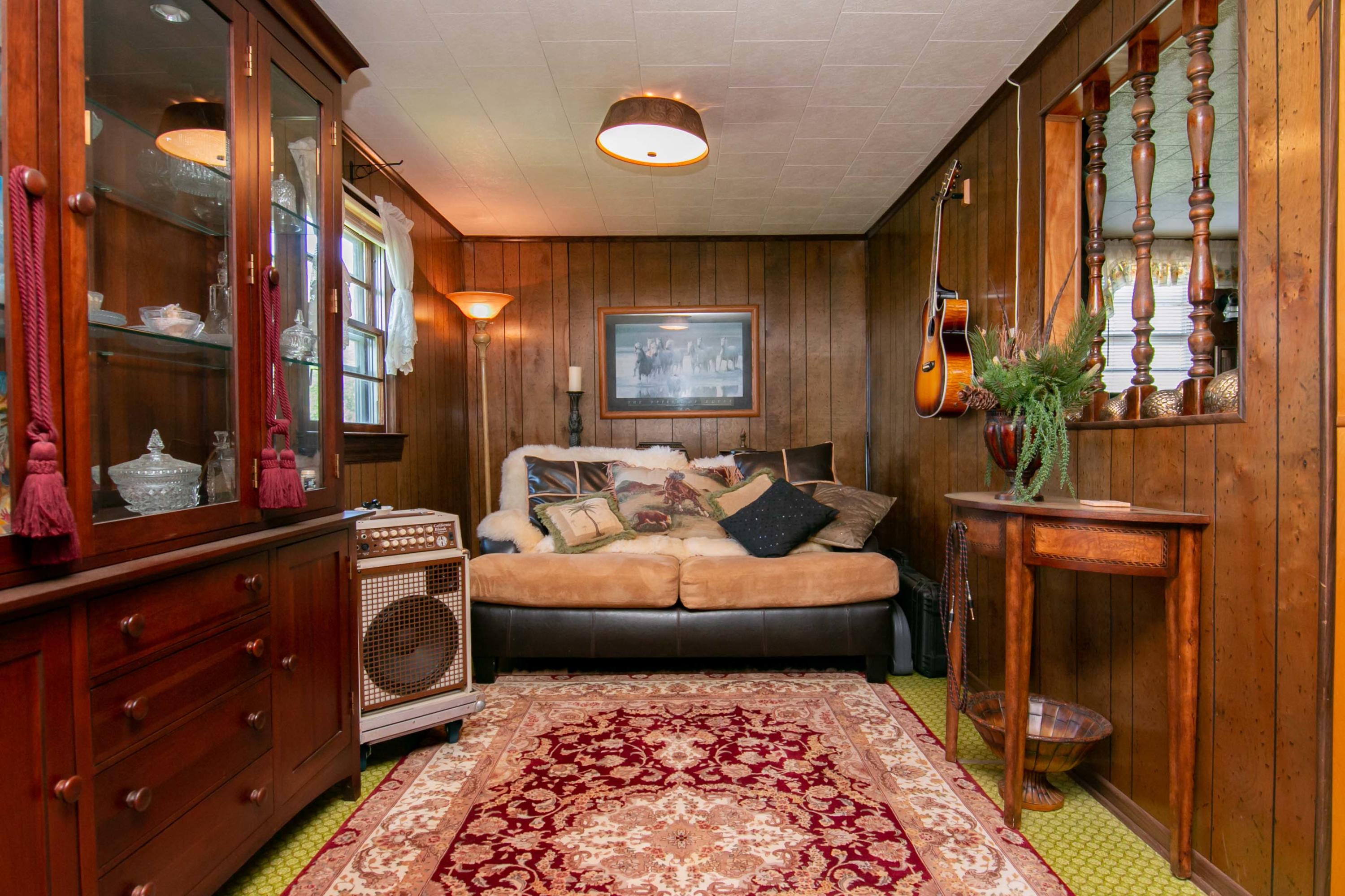 3257 Sago Road Chatham, VA 24531 - Photo 36 of 94 a living room with furniture and a rug