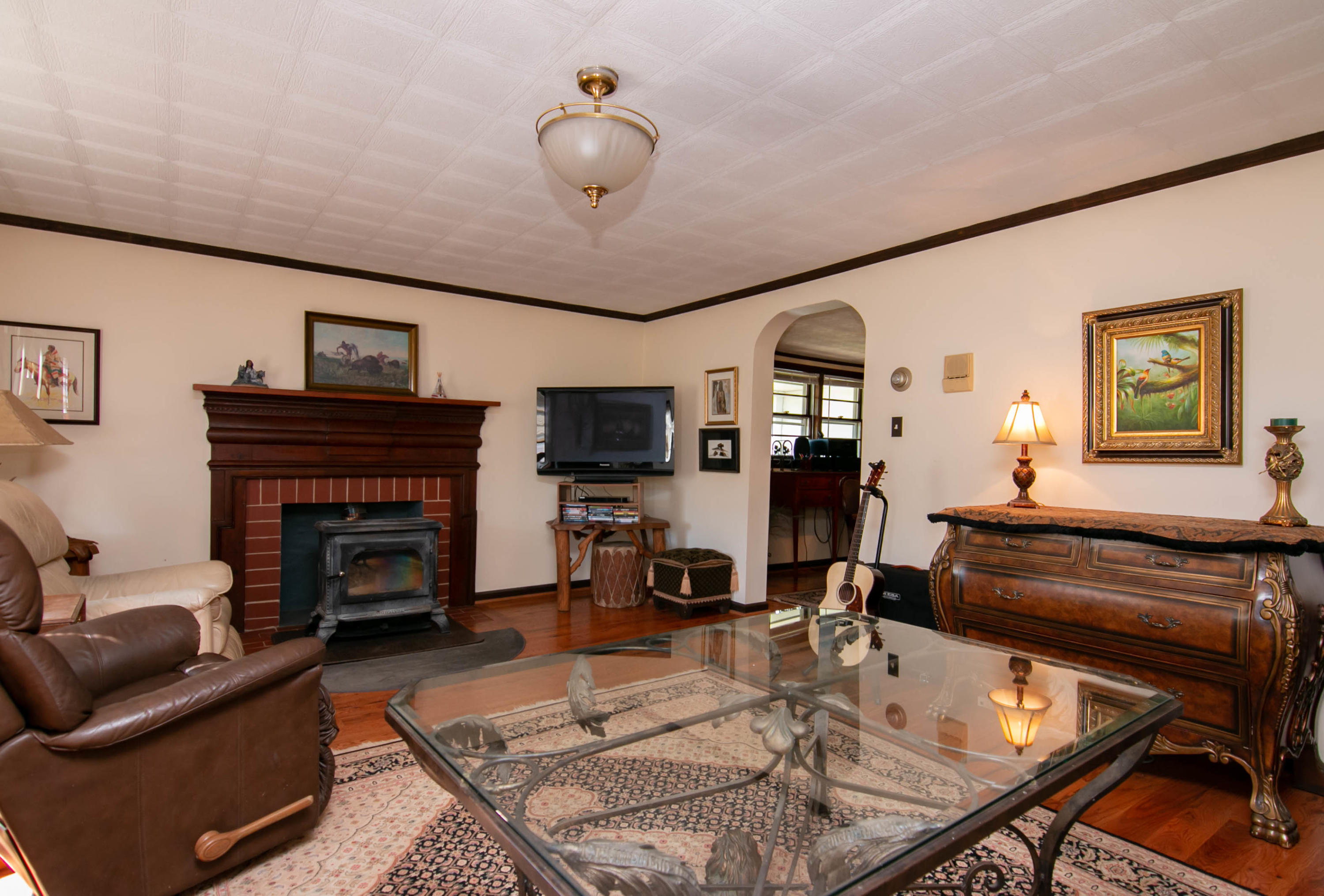3257 Sago Road Chatham, VA 24531 - Photo 41 of 94 a living room with furniture a fireplace and a flat screen tv