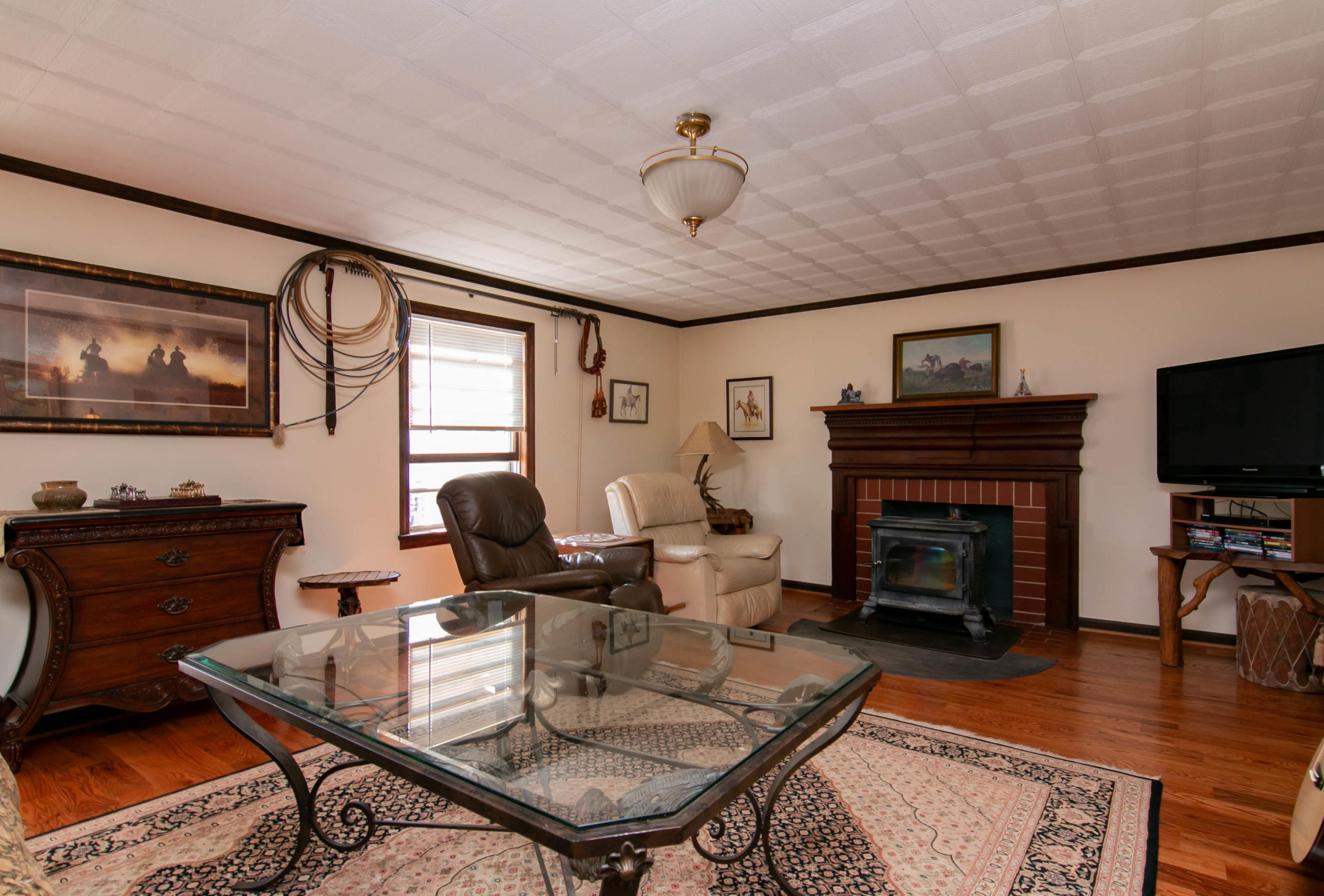 3257 Sago Road Chatham, VA 24531 - Photo 43 of 94 a living room with furniture a fireplace and a flat screen tv