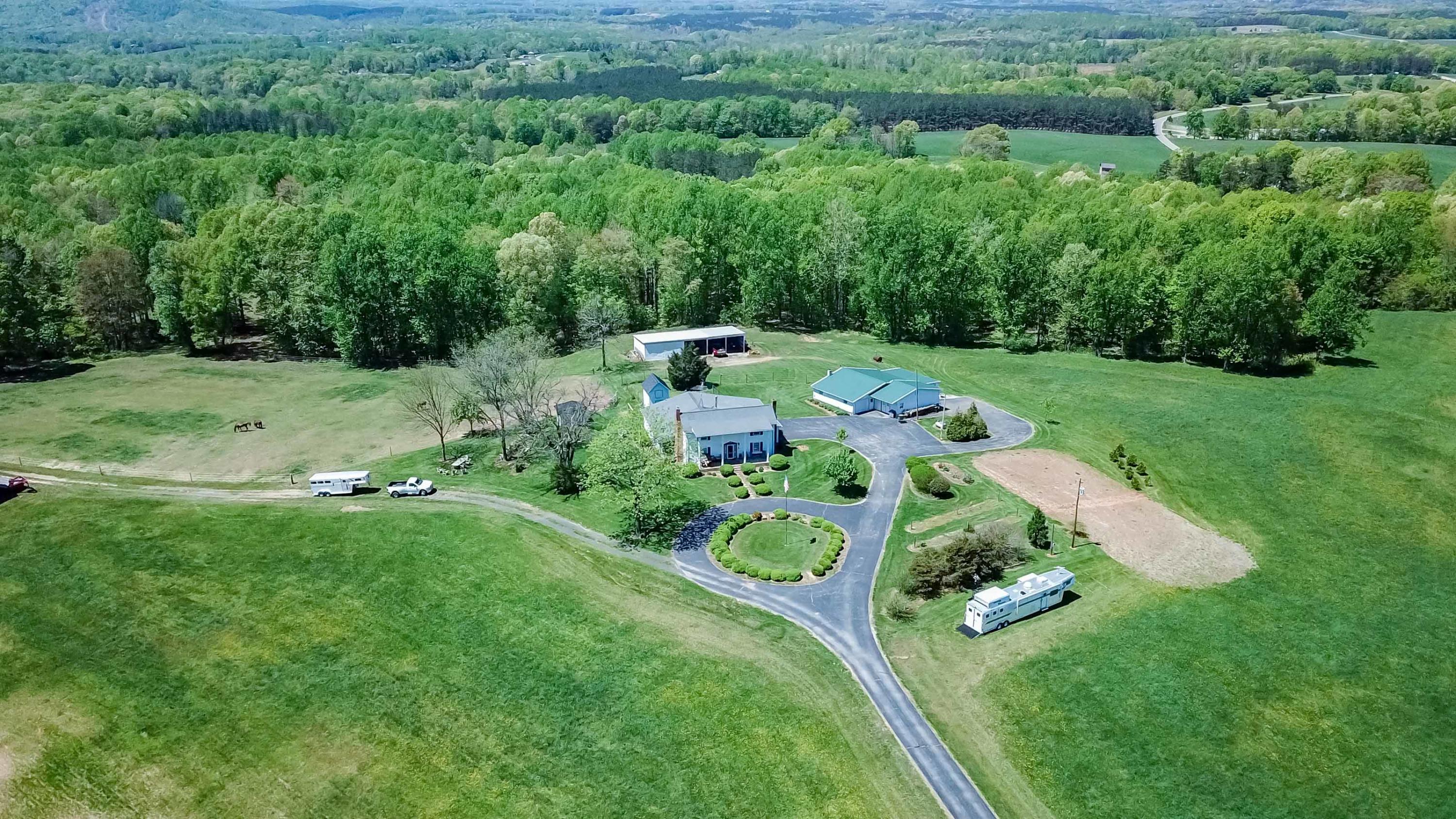 3257 Sago Road Chatham, VA 24531 - Photo 70 of 94 an aerial view of residential house with outdoor space and trees around