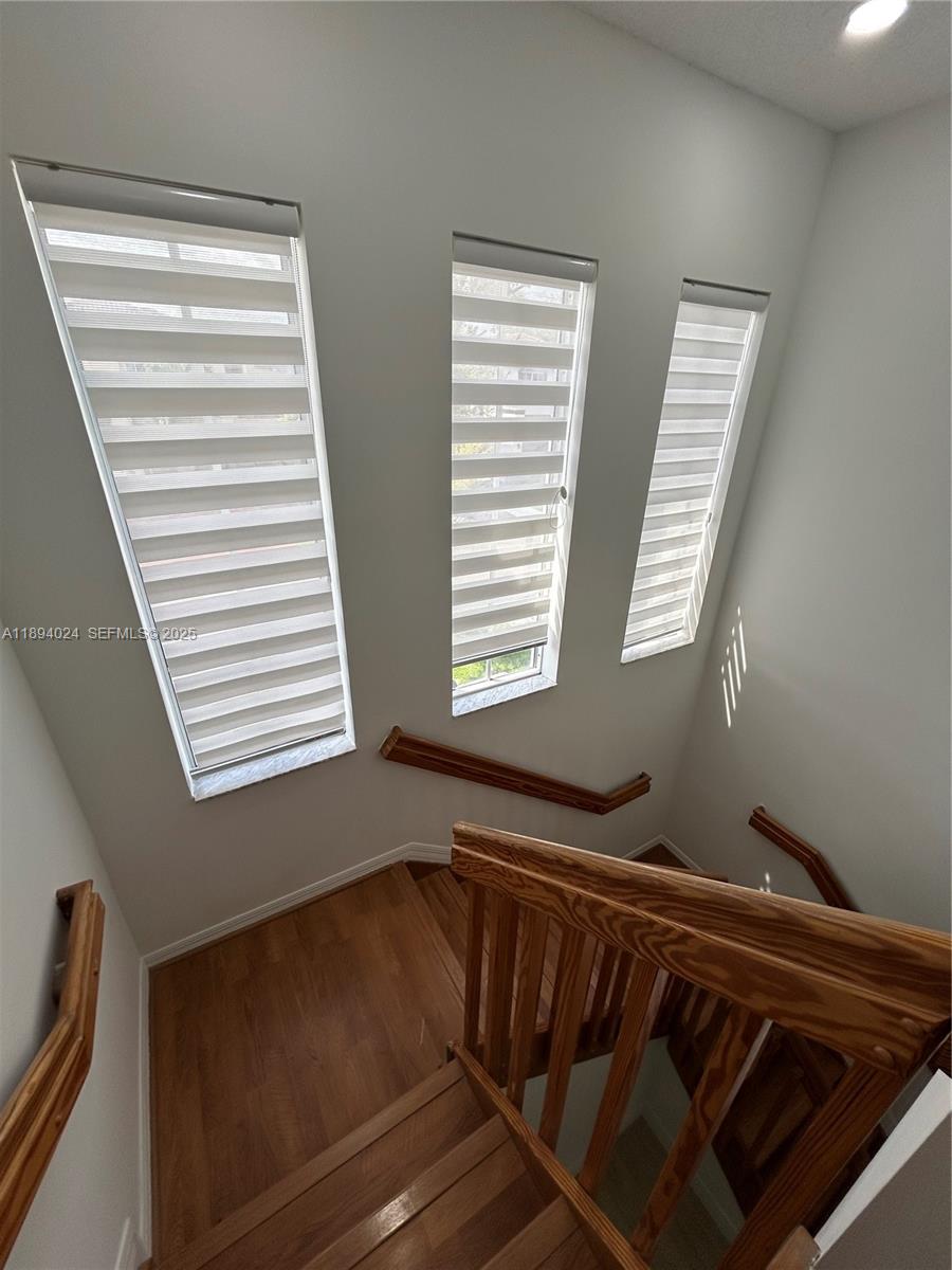8725 Southwest 158th Place Miami, FL 33193 - Photo 24 of 53 a view of wooden floor in a room