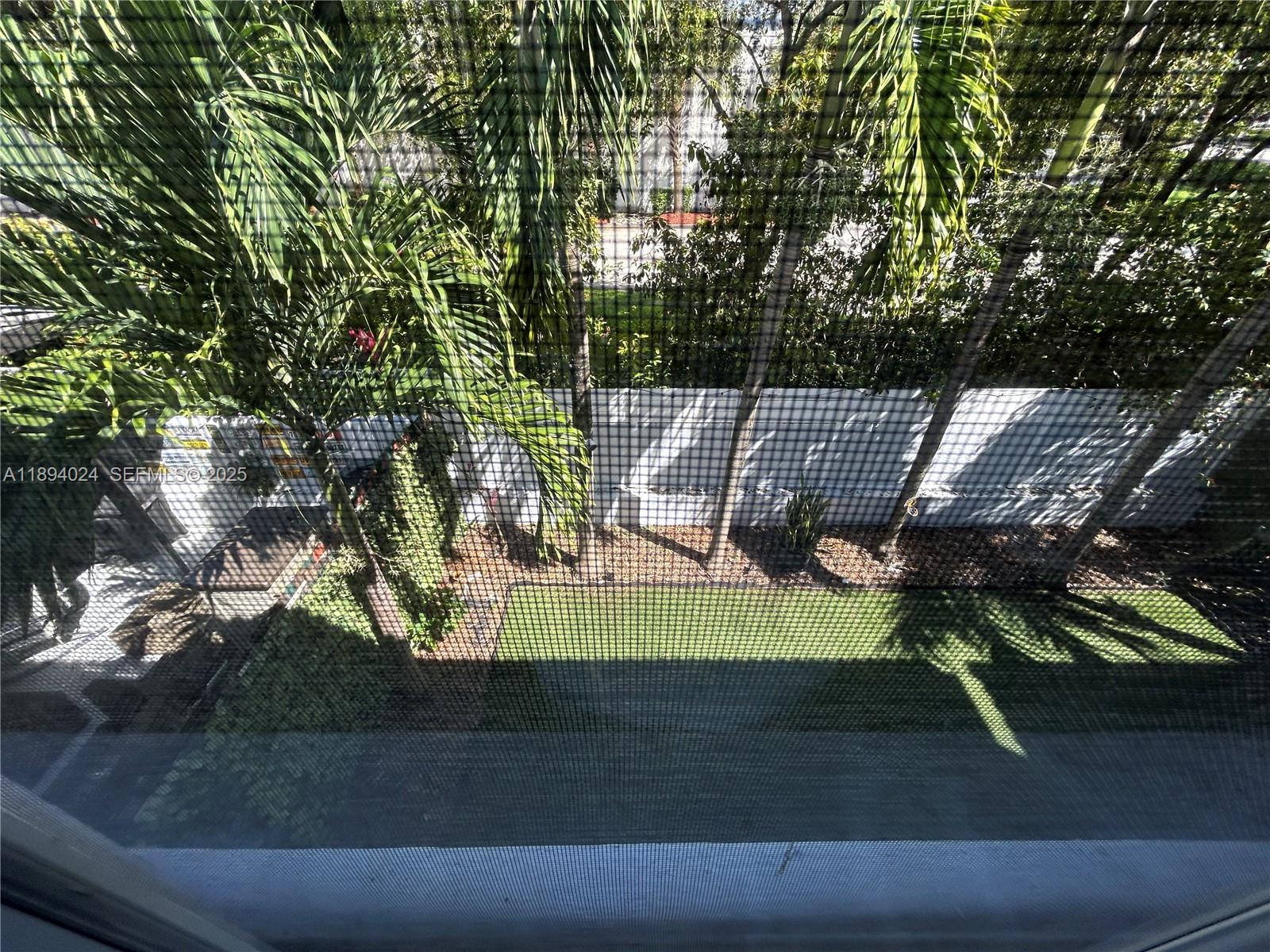 8725 Southwest 158th Place Miami, FL 33193 - Photo 46 of 53 a view of a deck with a yard