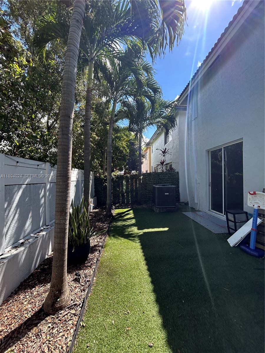 8725 Southwest 158th Place Miami, FL 33193 - Photo 49 of 53 a view of yard with green space