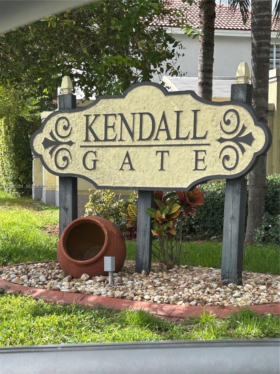 8725 Southwest 158th Place Miami, FL 33193 - Photo 53 of 53 a street sign on a pole on a street