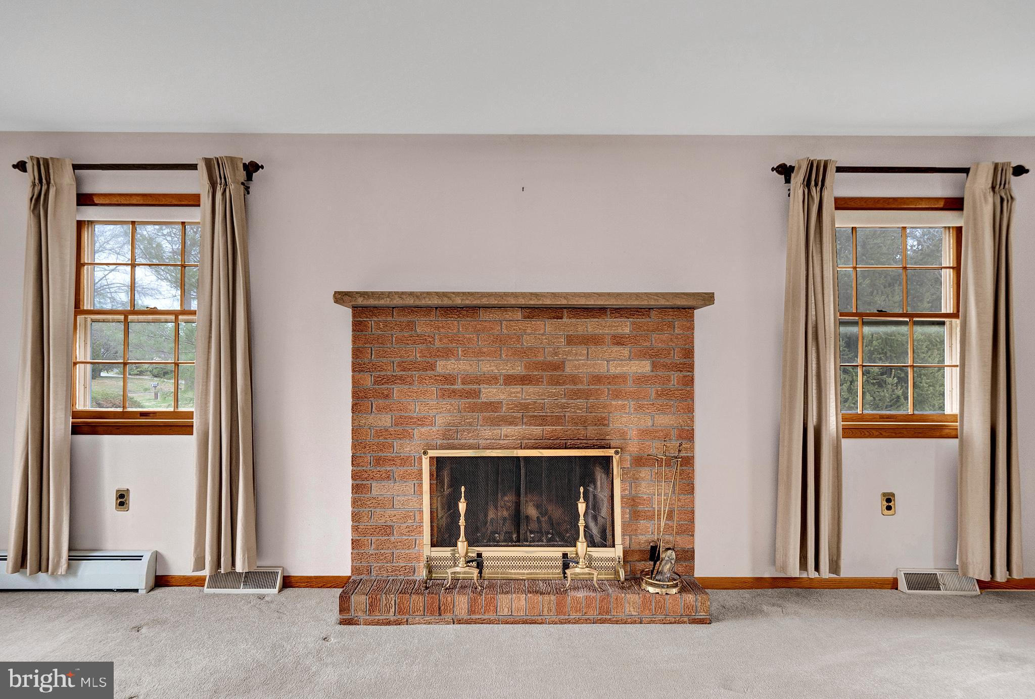 21 Fabrow Drive Titusville, NJ 08560 - Photo 11 of 43 a living room with a fireplace and a fireplace