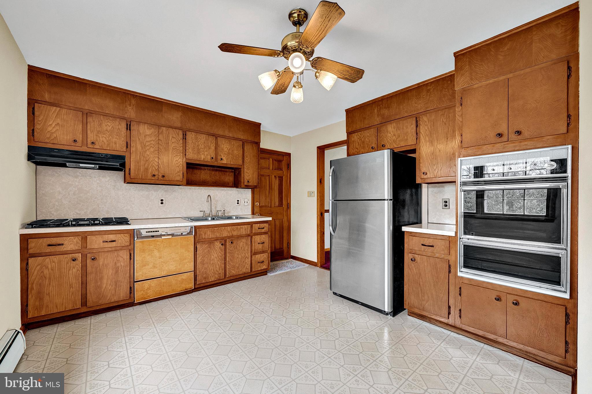 21 Fabrow Drive Titusville, NJ 08560 - Photo 12 of 43 a kitchen with stainless steel appliances granite countertop a refrigerator a stove and a sink