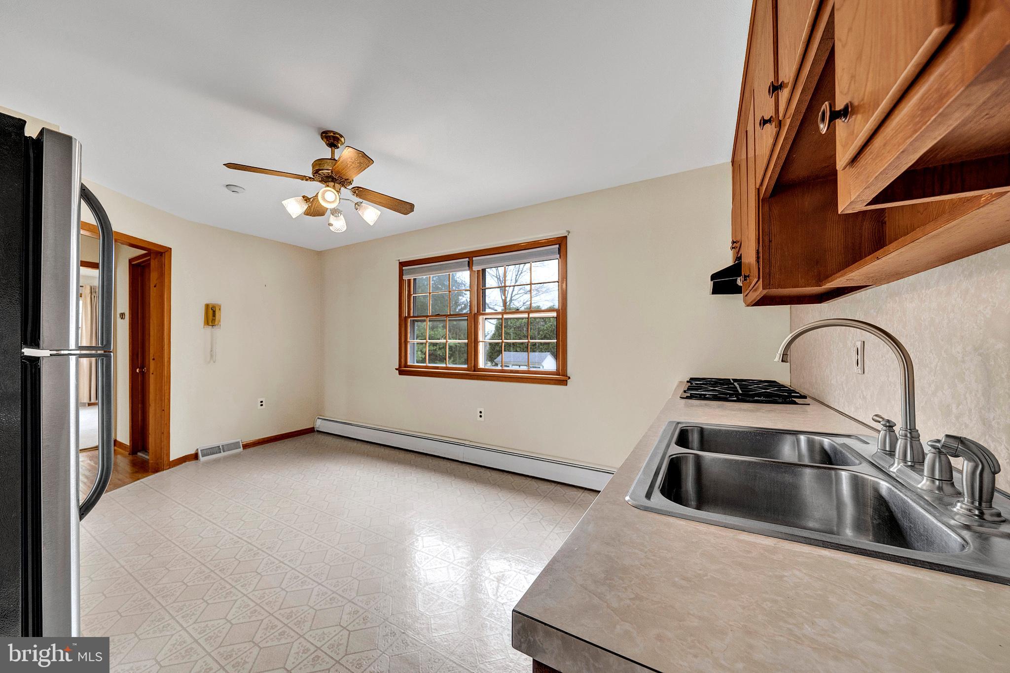 21 Fabrow Drive Titusville, NJ 08560 - Photo 14 of 43 a view of a kitchen with a sink a refrigerator freezer and a stove