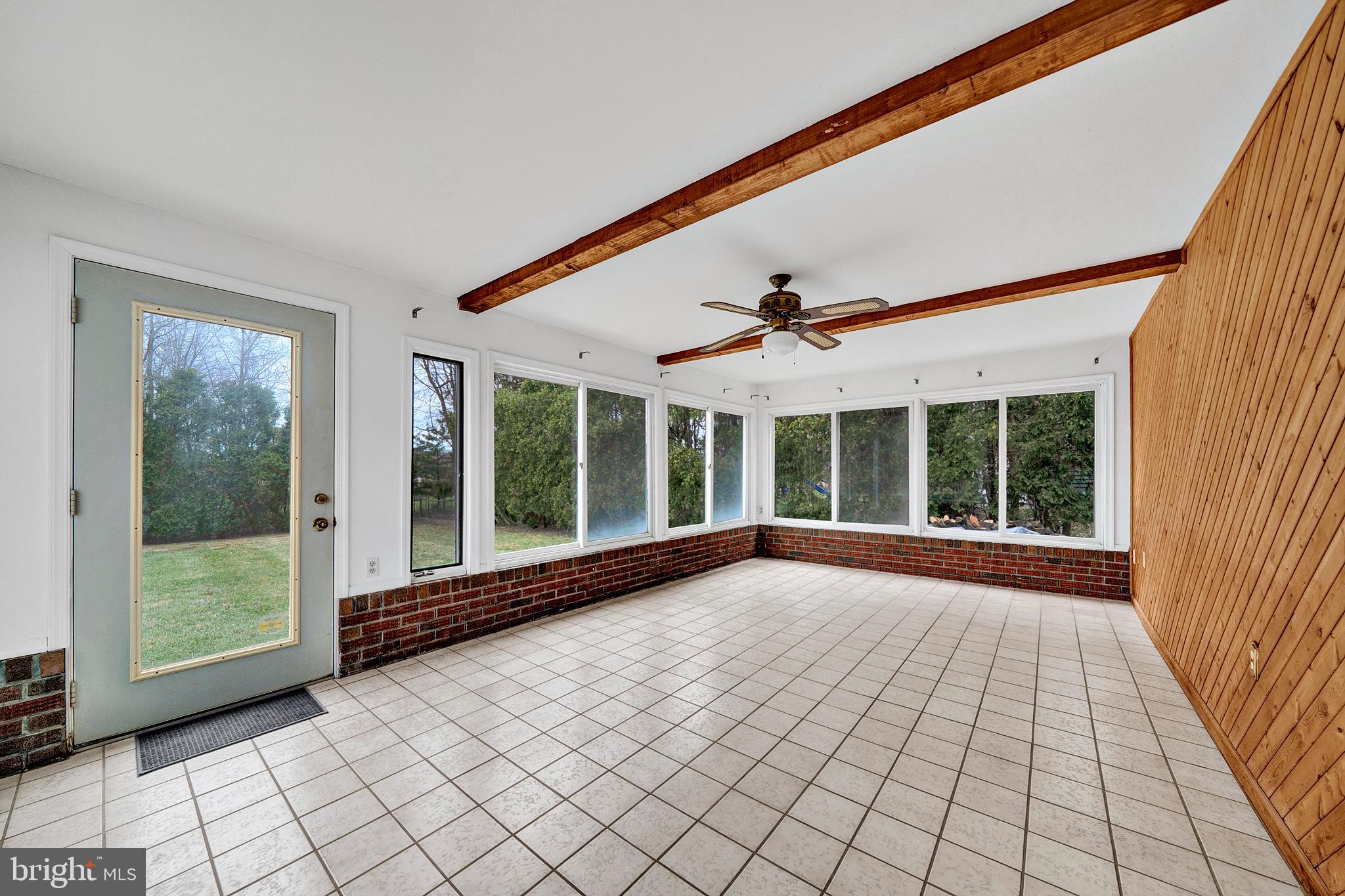 21 Fabrow Drive Titusville, NJ 08560 - Photo 18 of 43 a view of empty room with wooden floor and fan