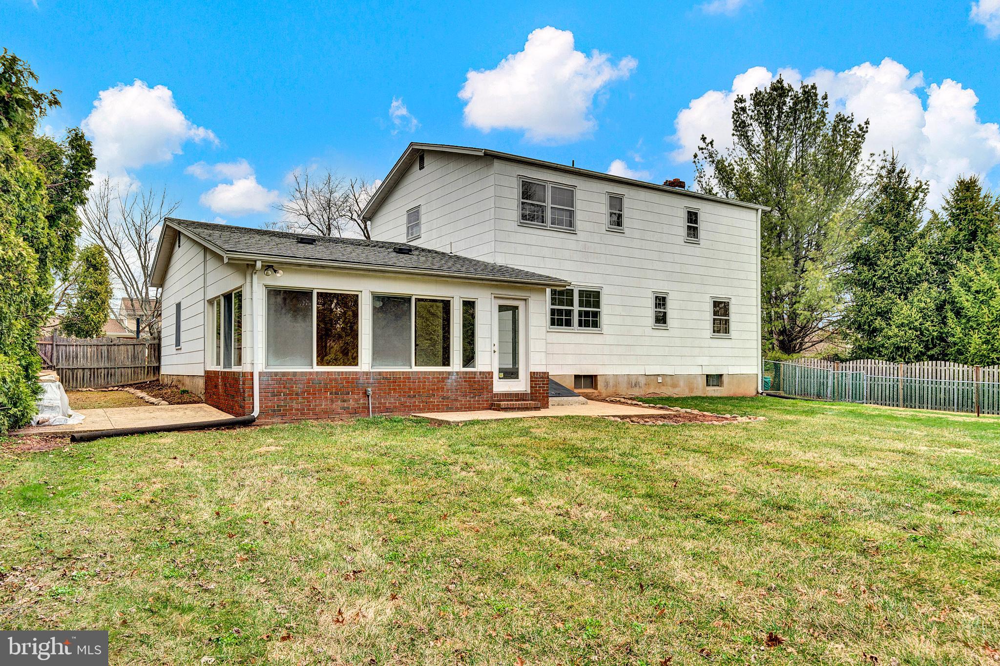 21 Fabrow Drive Titusville, NJ 08560 - Photo 38 of 43 a view of a house with a yard and a garden