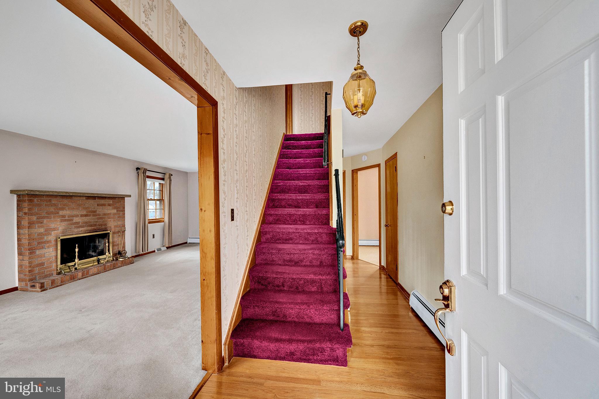 21 Fabrow Drive Titusville, NJ 08560 - Photo 4 of 43 a view of entryway and hall with wooden floor