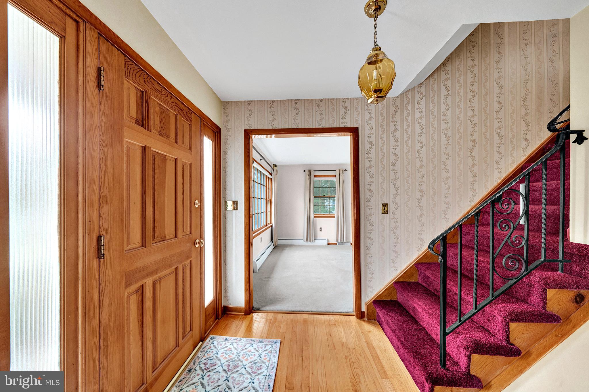21 Fabrow Drive Titusville, NJ 08560 - Photo 7 of 43 a view of a hallway with wooden floor and staircase