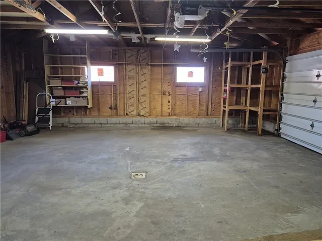 a view of empty room with chair