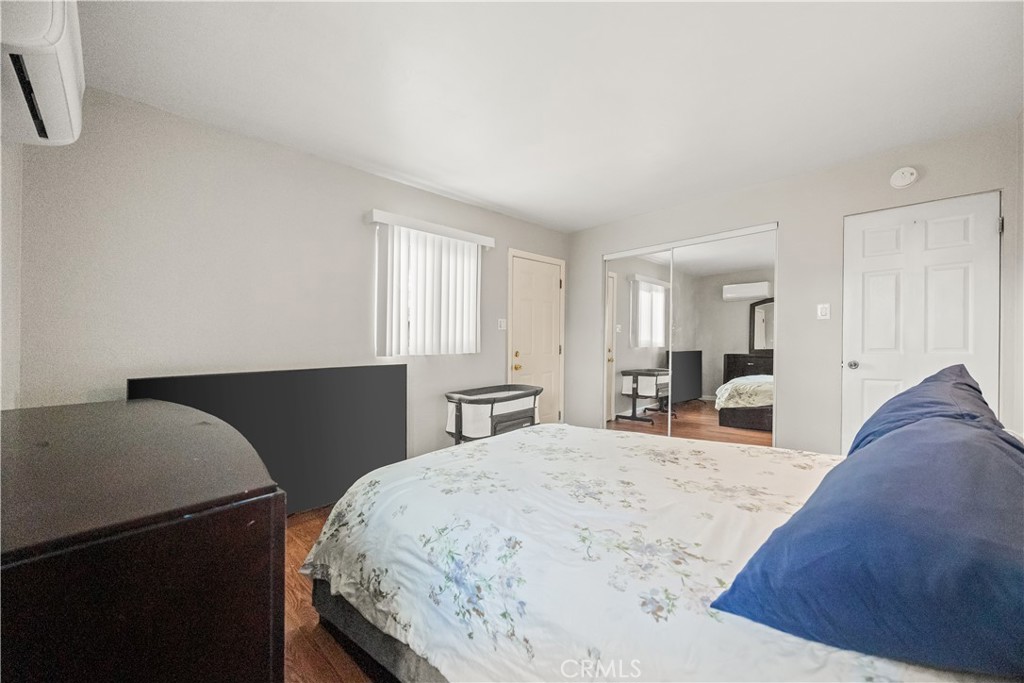 680 North 10th Street Banning, CA 92220 - Photo 11 of 24 a bedroom with a bed and a dresser