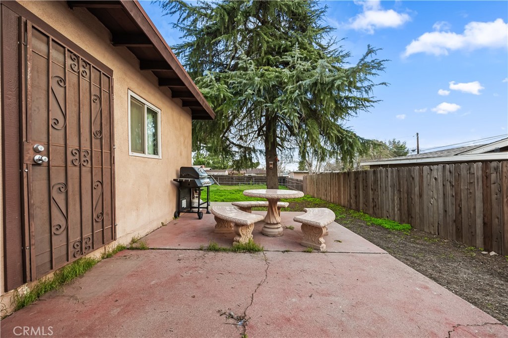 680 North 10th Street Banning, CA 92220 - Photo 22 of 24 a white bench sitting in front of a house