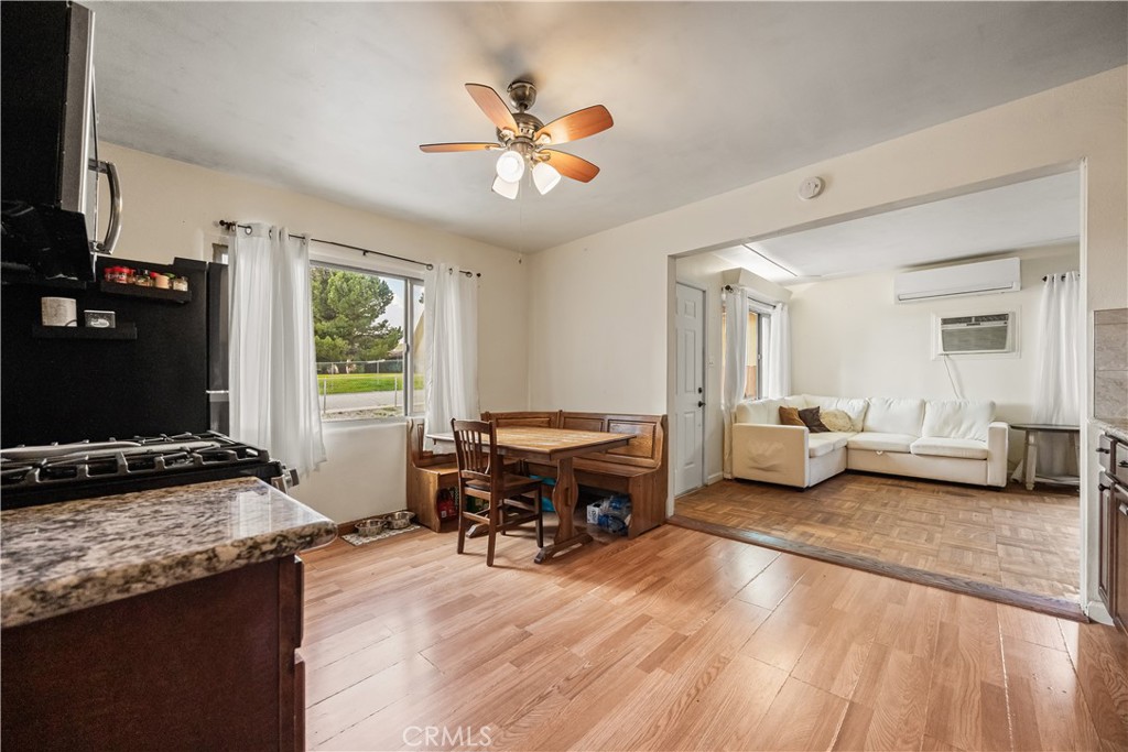 680 North 10th Street Banning, CA 92220 - Photo 6 of 24 a living room with furniture and a flat screen tv