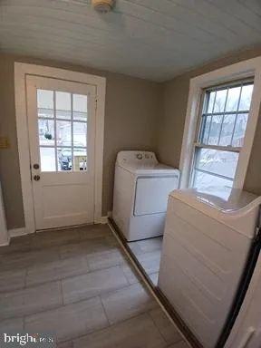 a view of livingroom with furniture and window