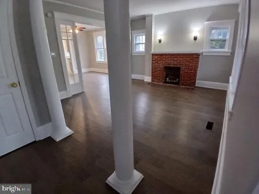 wooden floor in a hall with an entryway