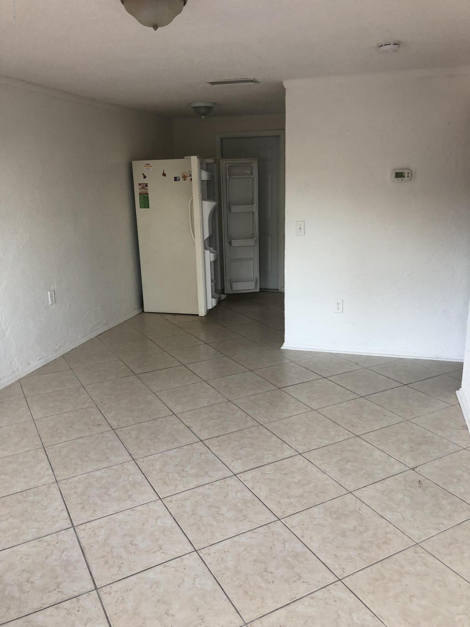 345 North Azure Lane Cocoa Beach, FL 32931 - Photo 3 of 6 345 azure to kitchen