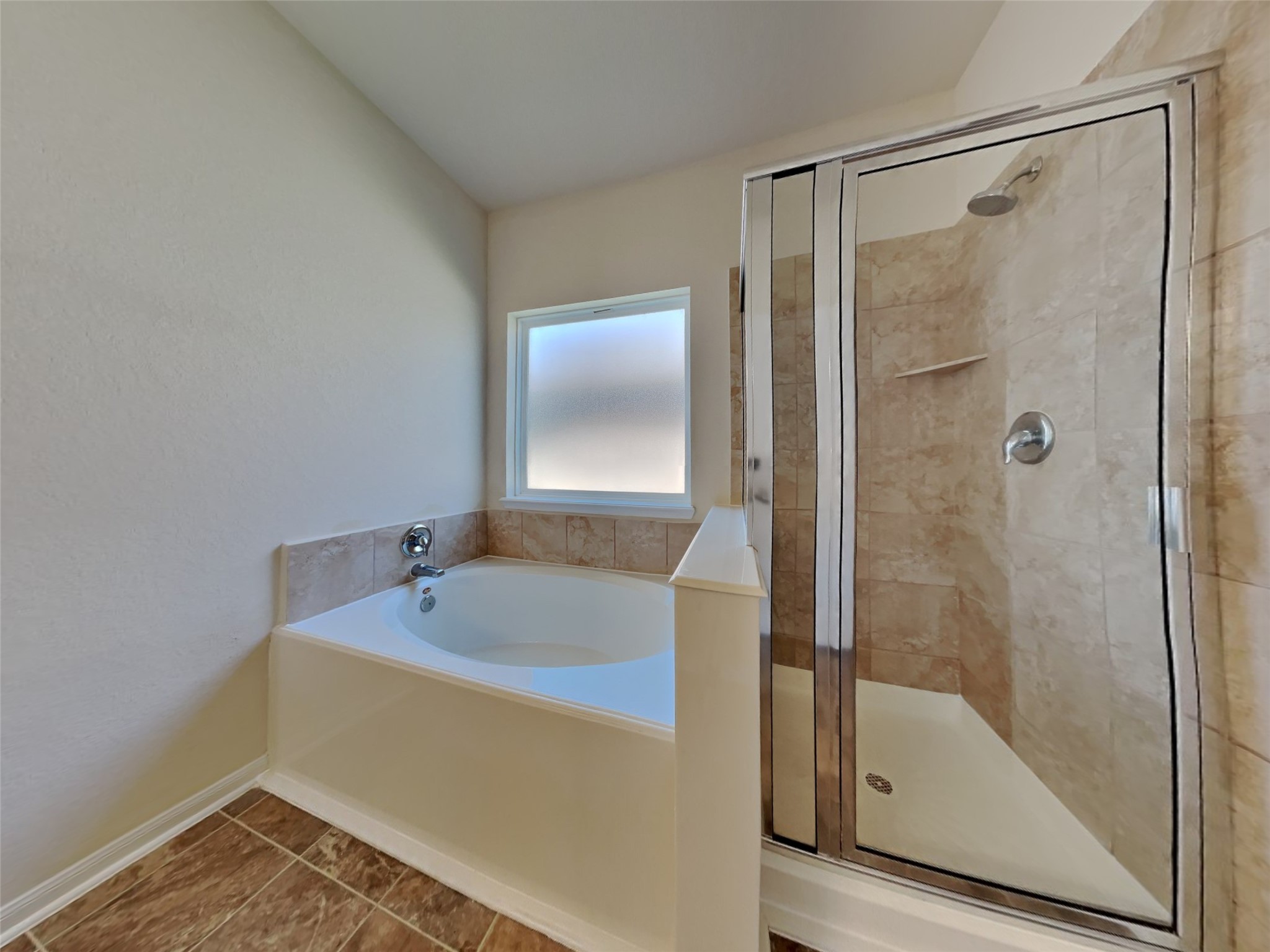 15315 Signal Ridge Way Cypress, TX 77429 - Photo 12 of 23 a bathroom with a tub and a shower