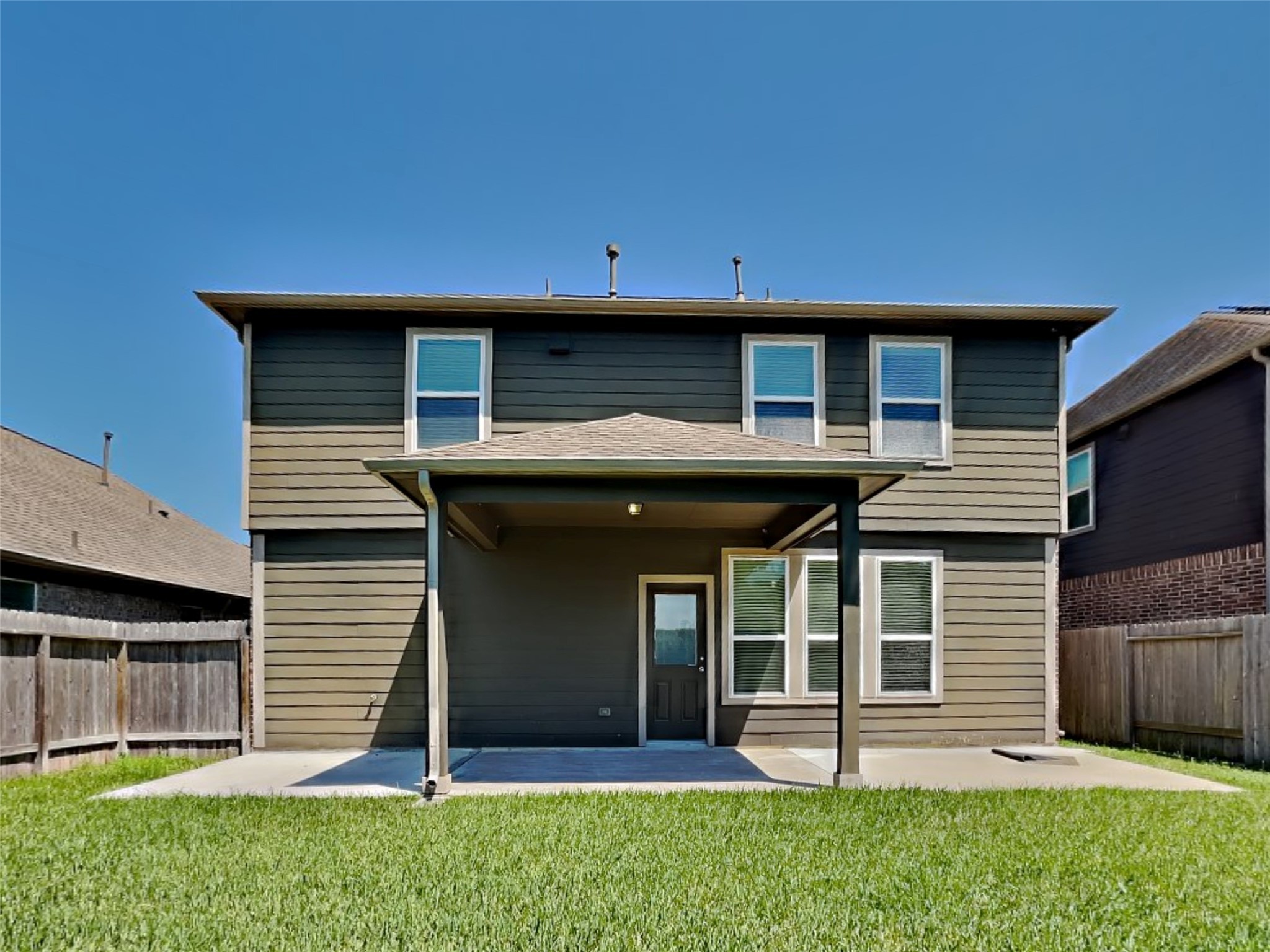 15315 Signal Ridge Way Cypress, TX 77429 - Photo 22 of 23 a front view of a house with a garden