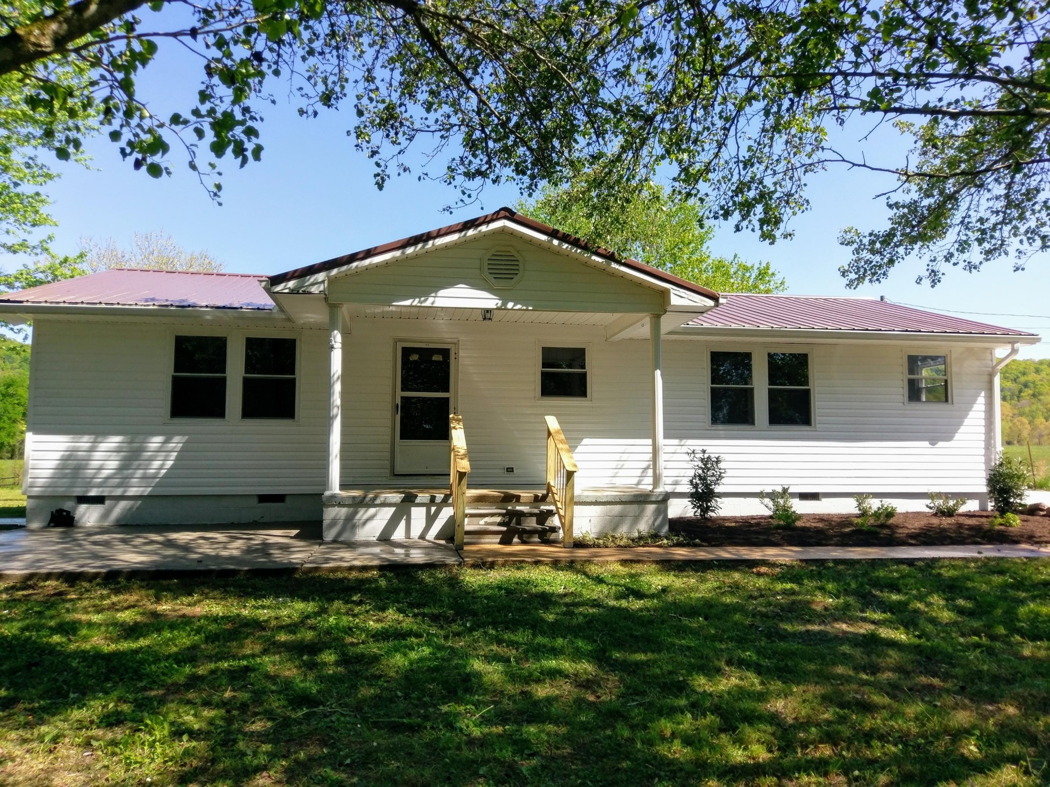 304 Cade Road Ten Mile, TN 37880 - Photo 1 of 19 a front view of house with yard