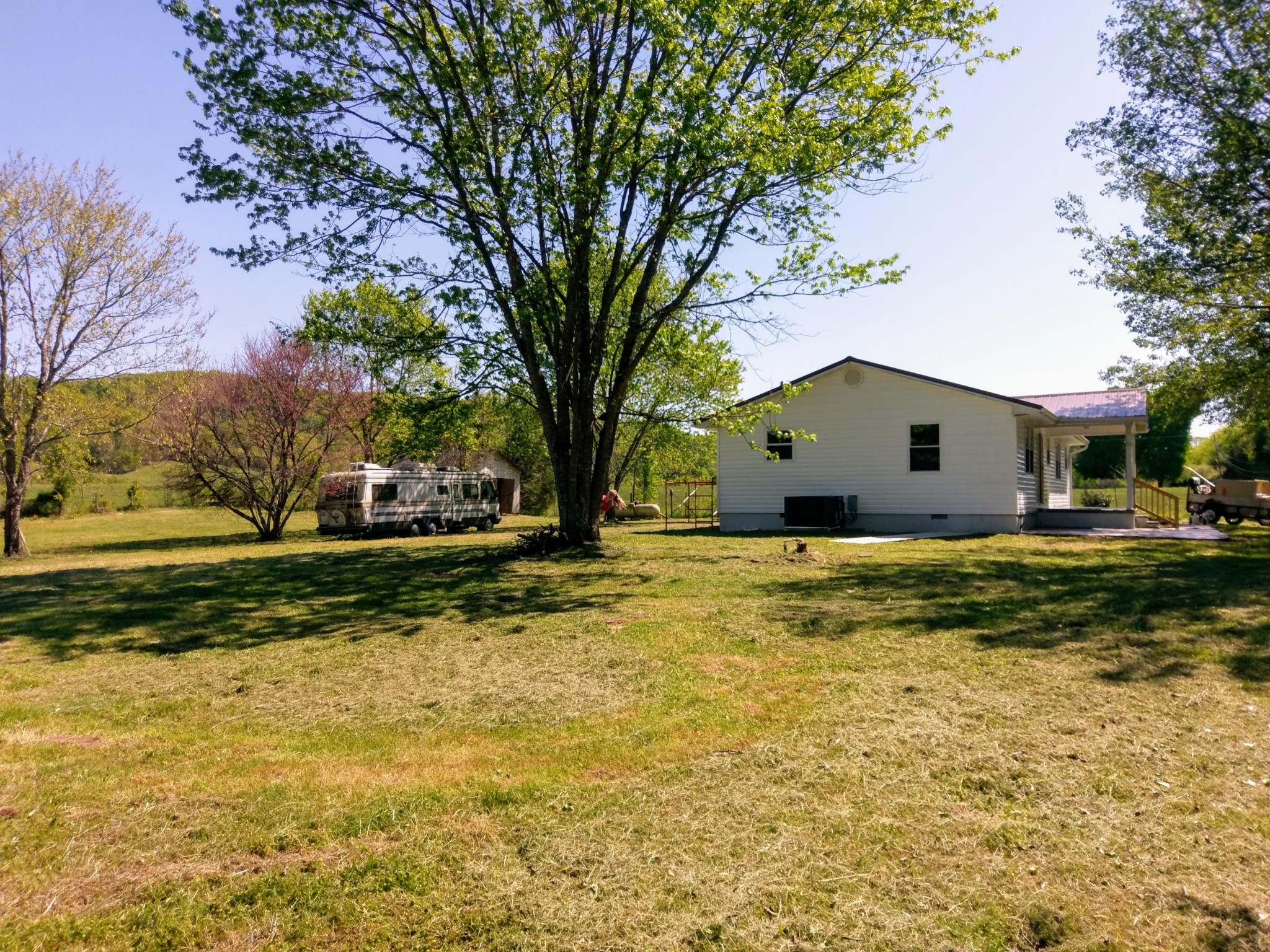 304 Cade Road Ten Mile, TN 37880 - Photo 16 of 19 a view of a house with a yard