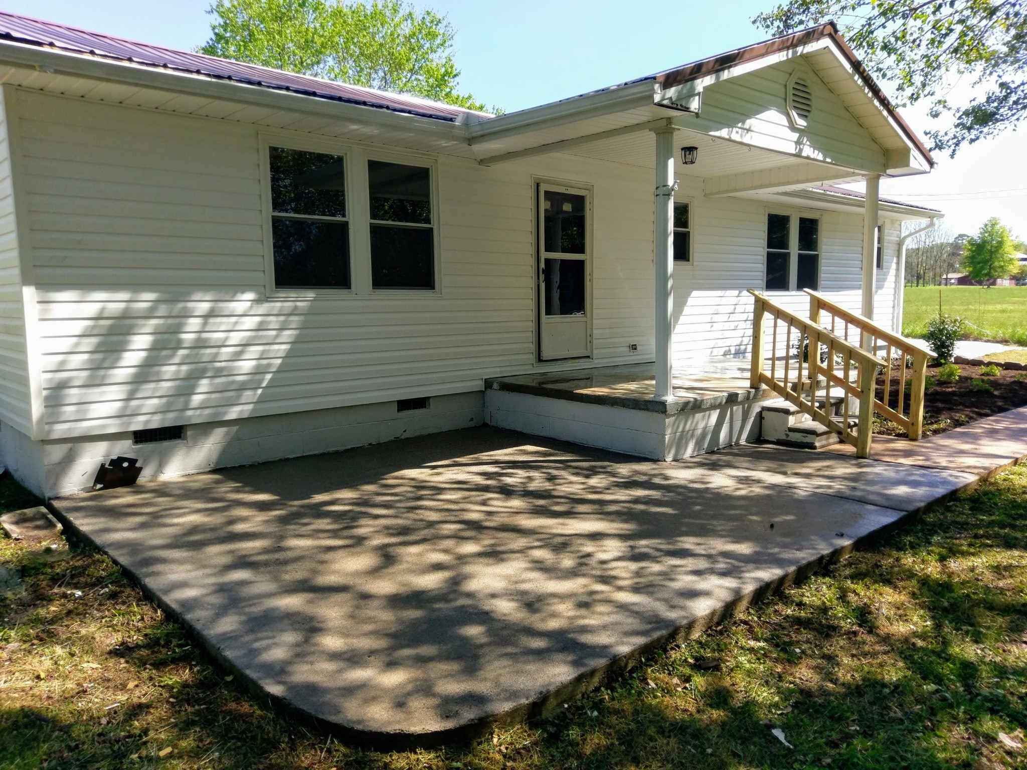 304 Cade Road Ten Mile, TN 37880 - Photo 2 of 19 a view of a house with a patio