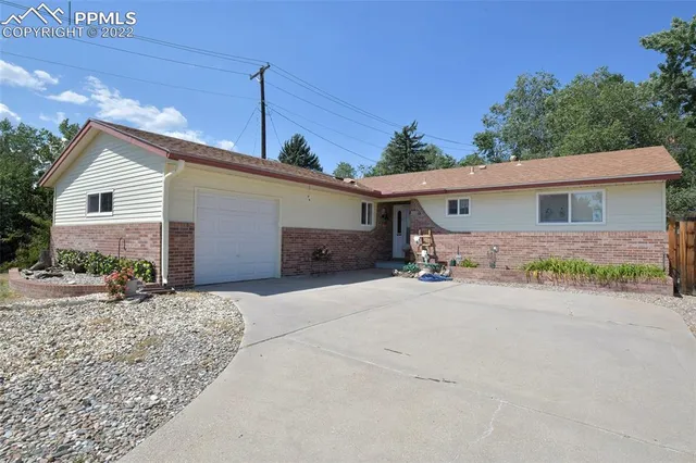 a view of a house with a patio